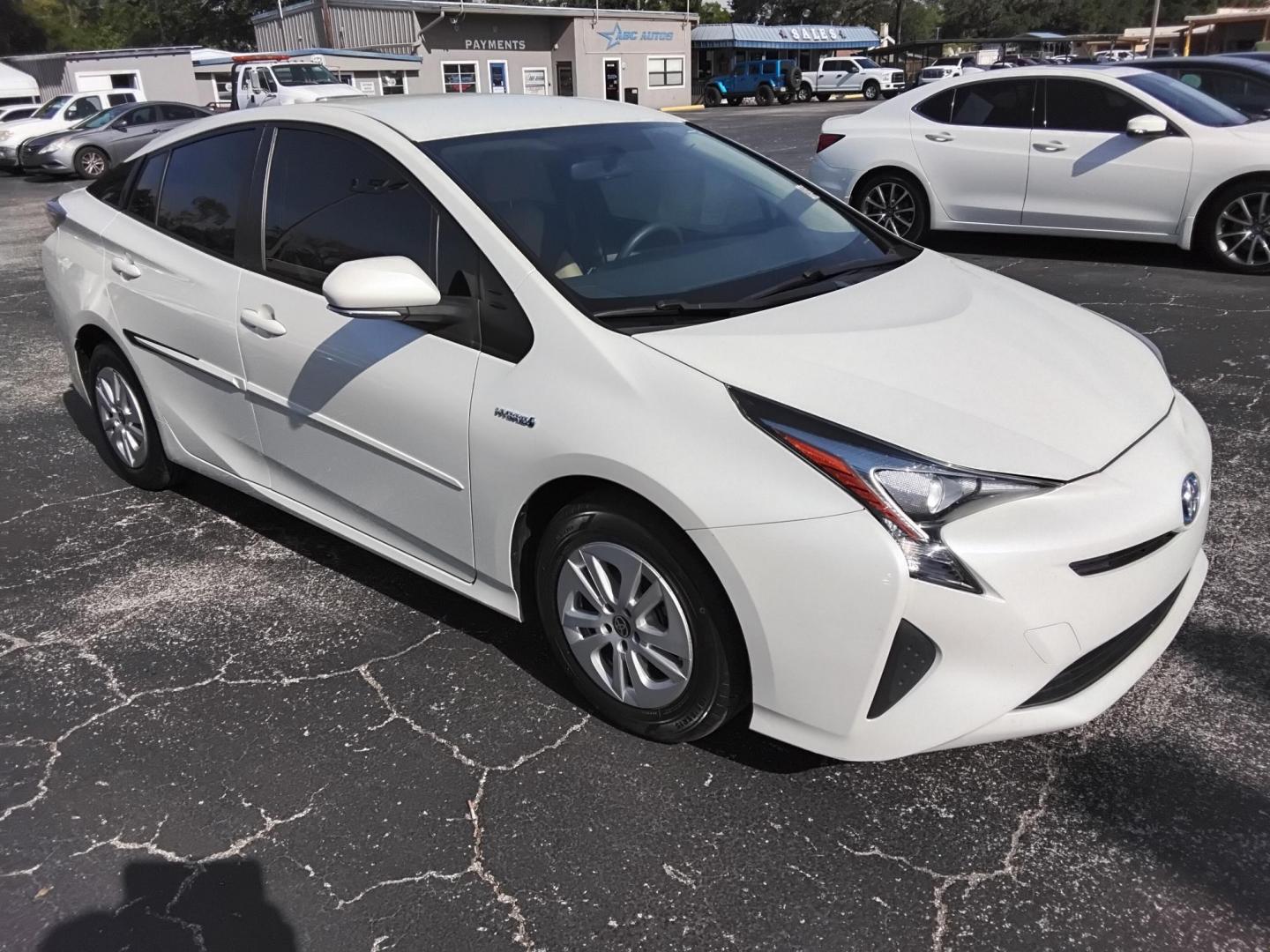2016 White /Beige Toyota Prius Two (JTDKBRFU1G3) with an 1.8L L4 DOHC 16V HYBRID engine, CVT transmission, located at 6112 N Florida Avenue, Tampa, FL, 33604, (888) 521-5131, 27.954929, -82.459534 - $499 down plus tax & tag. - Photo#6