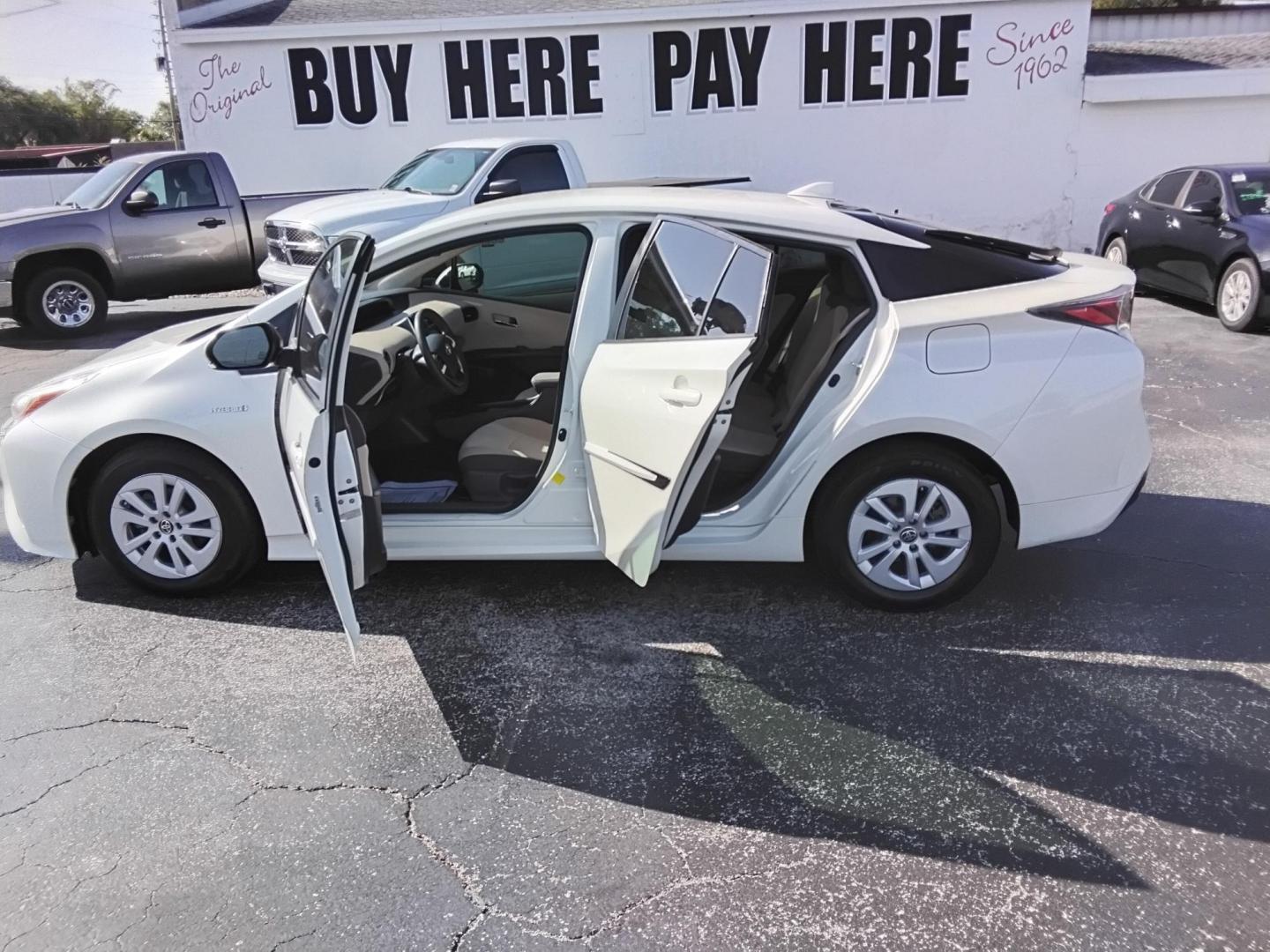 2016 White /Beige Toyota Prius Two (JTDKBRFU1G3) with an 1.8L L4 DOHC 16V HYBRID engine, CVT transmission, located at 6112 N Florida Avenue, Tampa, FL, 33604, (888) 521-5131, 27.954929, -82.459534 - $499 down plus tax & tag. - Photo#1