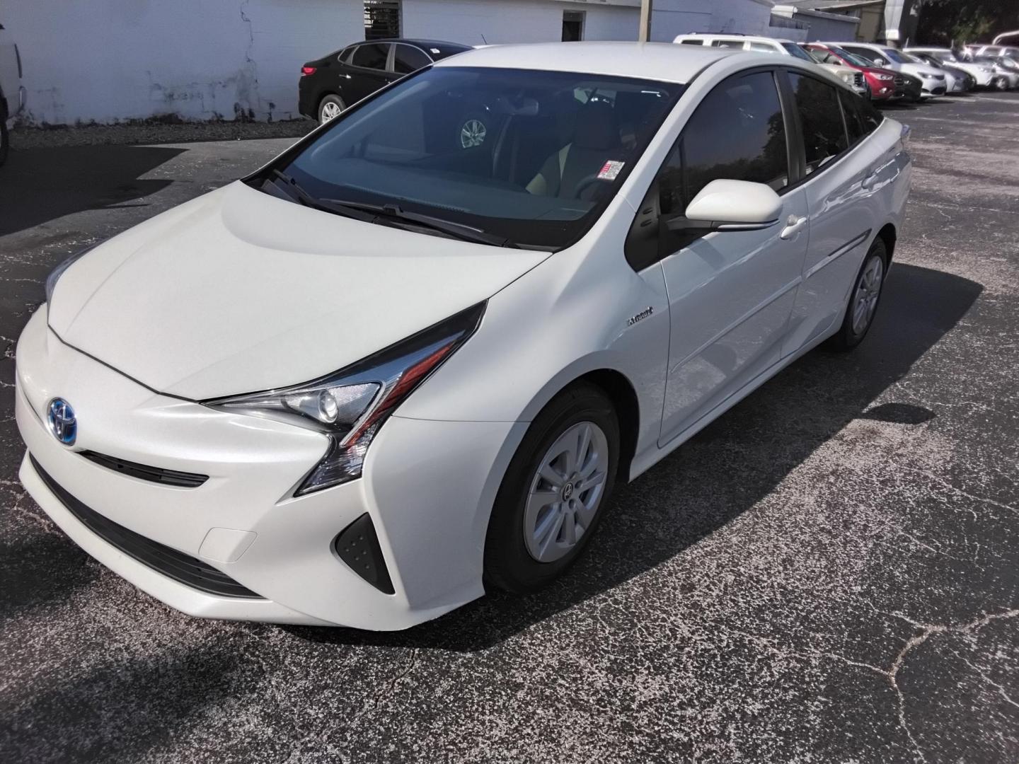 2016 White /Beige Toyota Prius Two (JTDKBRFU1G3) with an 1.8L L4 DOHC 16V HYBRID engine, CVT transmission, located at 6112 N Florida Avenue, Tampa, FL, 33604, (888) 521-5131, 27.954929, -82.459534 - $499 down plus tax & tag. - Photo#3