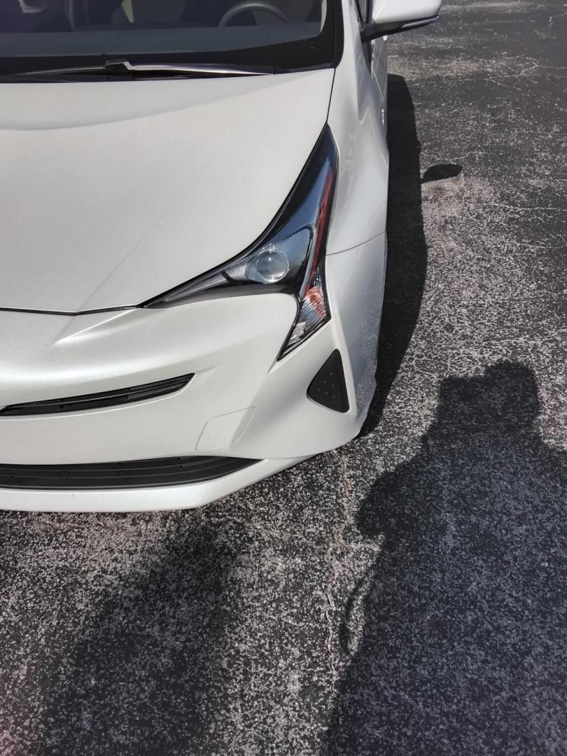 2016 White /Beige Toyota Prius Two (JTDKBRFU1G3) with an 1.8L L4 DOHC 16V HYBRID engine, CVT transmission, located at 6112 N Florida Avenue, Tampa, FL, 33604, (888) 521-5131, 27.954929, -82.459534 - $499 down plus tax & tag. - Photo#5
