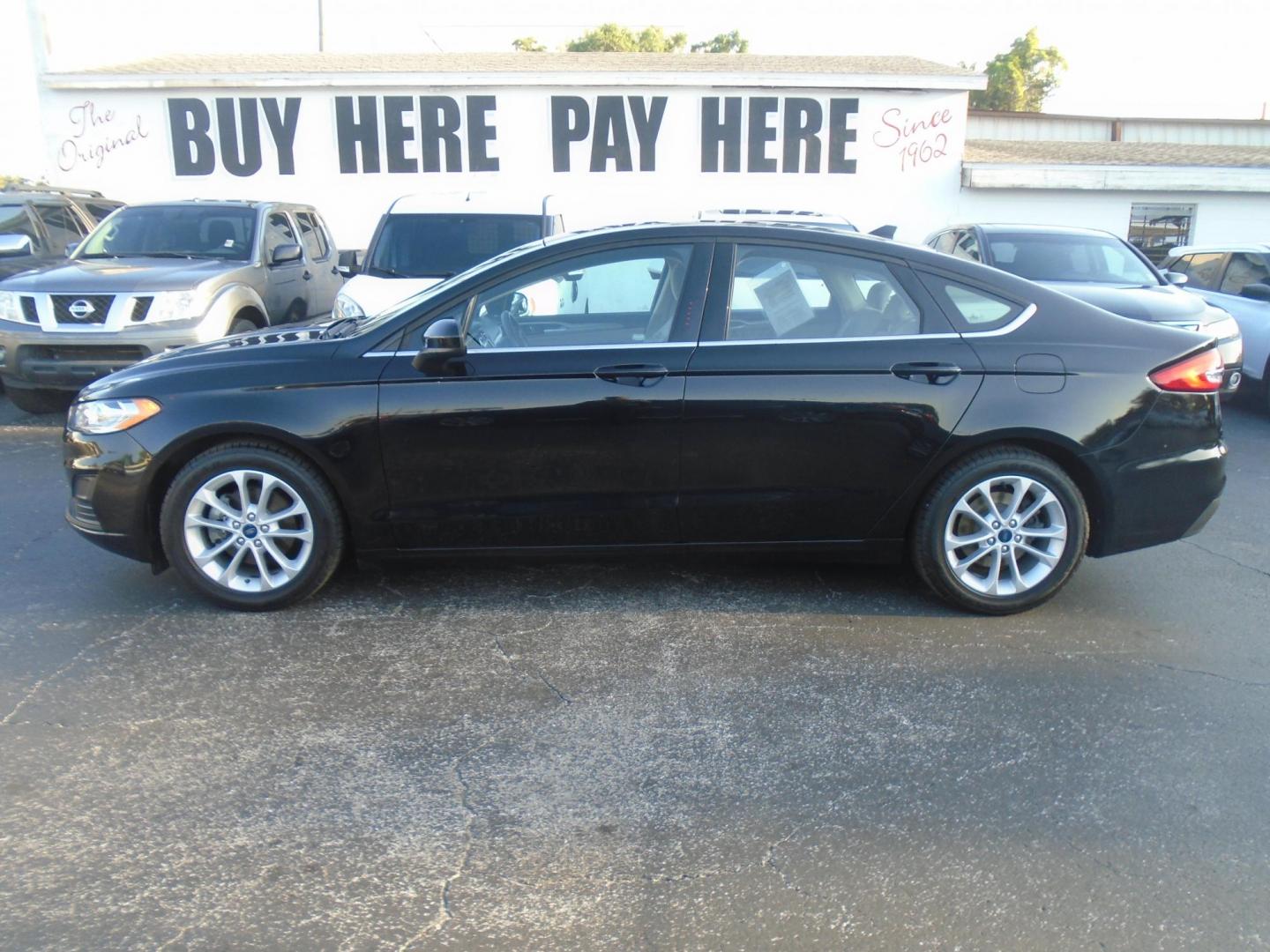 2019 Ford Fusion SE (3FA6P0HD3KR) with an 1.5L L4 DOHC 16V engine, 6A transmission, located at 6112 N Florida Avenue, Tampa, FL, 33604, (888) 521-5131, 27.954929, -82.459534 - Photo#0