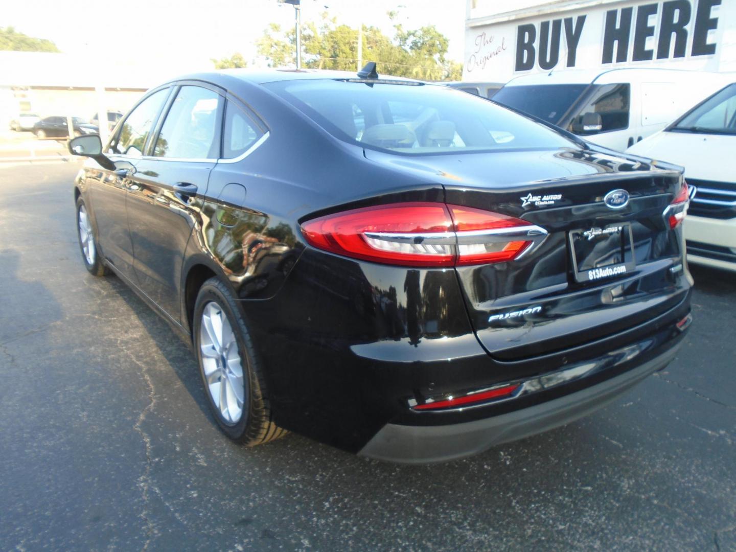 2019 Ford Fusion SE (3FA6P0HD3KR) with an 1.5L L4 DOHC 16V engine, 6A transmission, located at 6112 N Florida Avenue, Tampa, FL, 33604, (888) 521-5131, 27.954929, -82.459534 - Photo#6