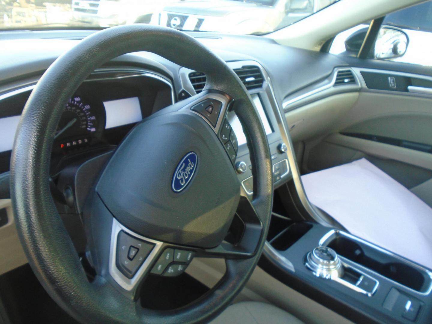 2019 Ford Fusion SE (3FA6P0HD3KR) with an 1.5L L4 DOHC 16V engine, 6A transmission, located at 6112 N Florida Avenue, Tampa, FL, 33604, (888) 521-5131, 27.954929, -82.459534 - Photo#9