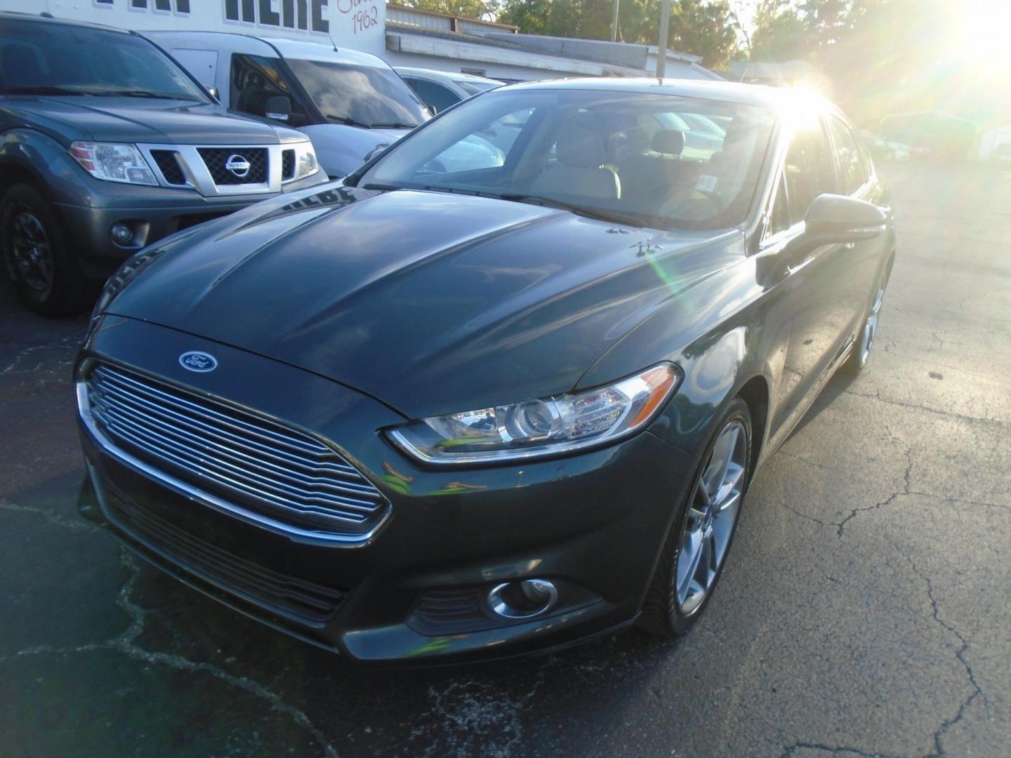 2015 Ford Fusion SE (1FA6P0HDXF5) with an 1.5L L4 DOHC 16V engine, located at 6112 N Florida Avenue, Tampa, FL, 33604, (888) 521-5131, 27.954929, -82.459534 - Photo#4