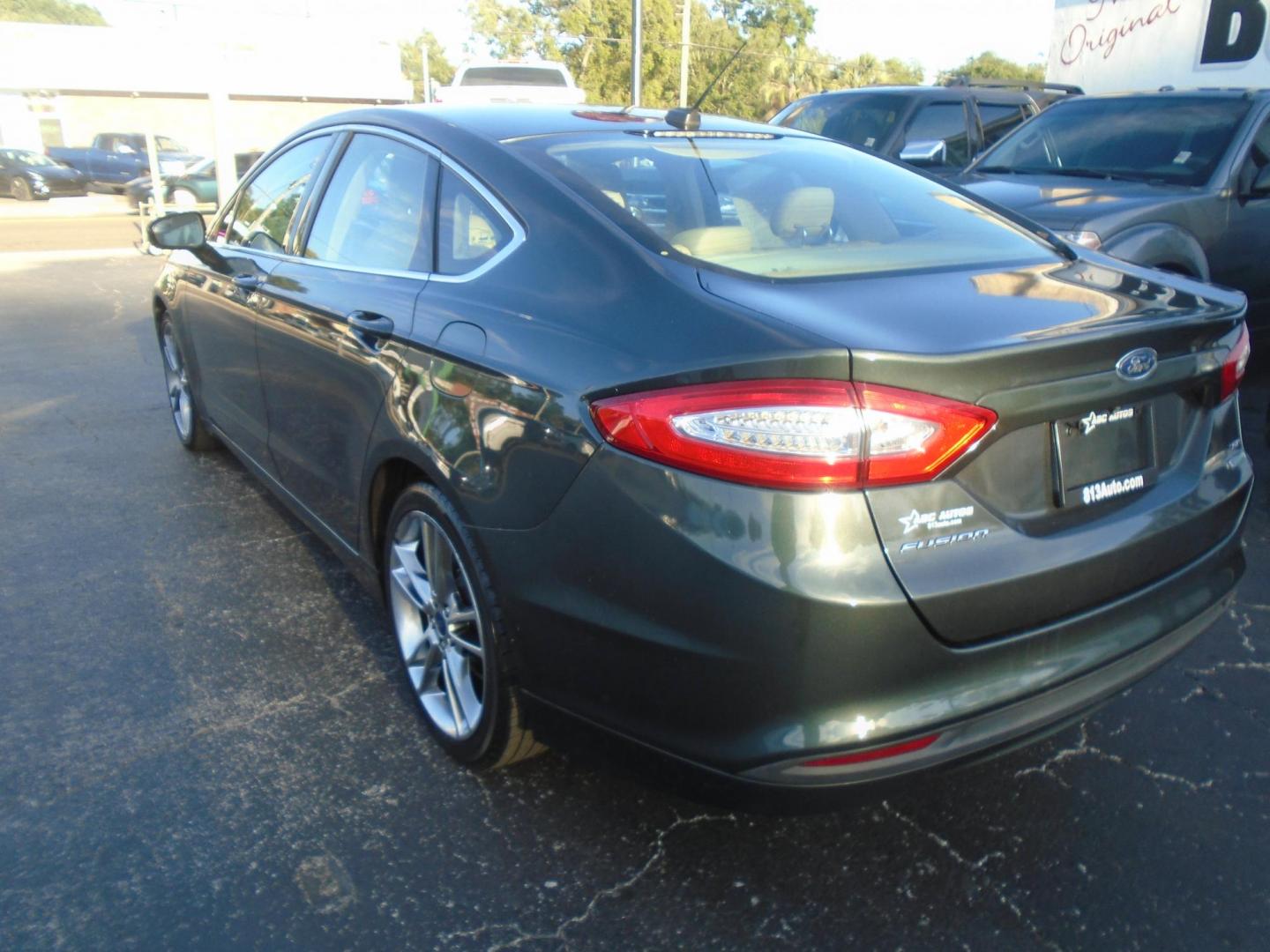 2015 Ford Fusion SE (1FA6P0HDXF5) with an 1.5L L4 DOHC 16V engine, located at 6112 N Florida Avenue, Tampa, FL, 33604, (888) 521-5131, 27.954929, -82.459534 - Photo#5