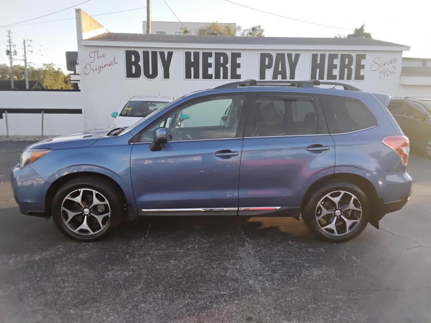 2015 BLUE /Grey Subaru Forester 2.0XT Touring (JF2SJGWC2FH) with an 2.0L H4 SOHC 16V engine, 6-Speed Automatic transmission, located at 6112 N Florida Avenue, Tampa, FL, 33604, (888) 521-5131, 27.954929, -82.459534 - $499 down plus tax & tag. - Photo#0
