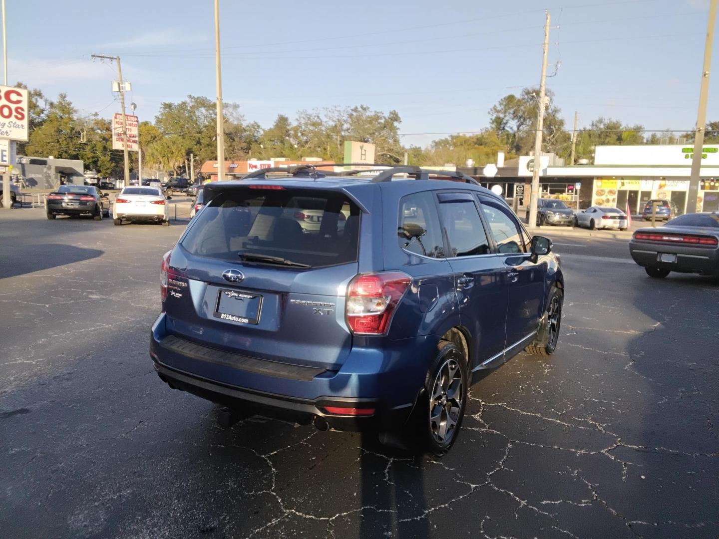 2015 BLUE /Grey Subaru Forester 2.0XT Touring (JF2SJGWC2FH) with an 2.0L H4 SOHC 16V engine, 6-Speed Automatic transmission, located at 6112 N Florida Avenue, Tampa, FL, 33604, (888) 521-5131, 27.954929, -82.459534 - $499 down plus tax & tag. - Photo#5