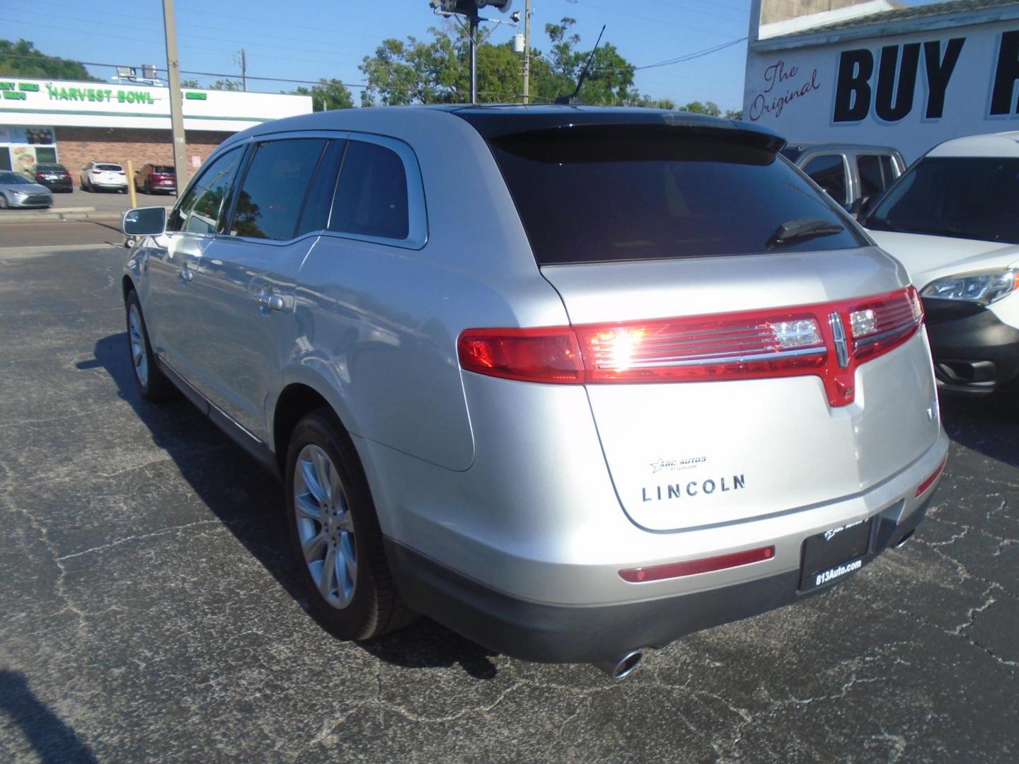 2014 Lincoln MKT 3.7L FWD (2LMHJ5FK4EB) with an 3.7L V6 DOHC 24V engine, 6-Speed Automatic transmission, located at 6112 N Florida Avenue, Tampa, FL, 33604, (888) 521-5131, 27.954929, -82.459534 - Photo#4