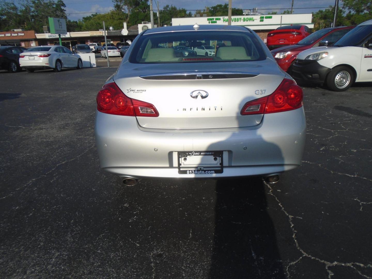 2013 Infiniti G Sedan 37 Journey (JN1CV6AP9DM) with an 3.7L V6 DOHC 24V engine, 5-Speed Automatic transmission, located at 6112 N Florida Avenue, Tampa, FL, 33604, (888) 521-5131, 27.954929, -82.459534 - Photo#4