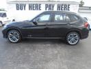 2014 BMW X1 xDrive28i (WBAVL1C55EV) with an 2.0L L4 DOHC 16V engine, 8-Speed Automatic transmission, located at 6112 N Florida Avenue, Tampa, FL, 33604, (888) 521-5131, 27.954929, -82.459534 - Photo#0
