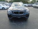 2014 BMW X1 xDrive28i (WBAVL1C55EV) with an 2.0L L4 DOHC 16V engine, 8-Speed Automatic transmission, located at 6112 N Florida Avenue, Tampa, FL, 33604, (888) 521-5131, 27.954929, -82.459534 - Photo#1