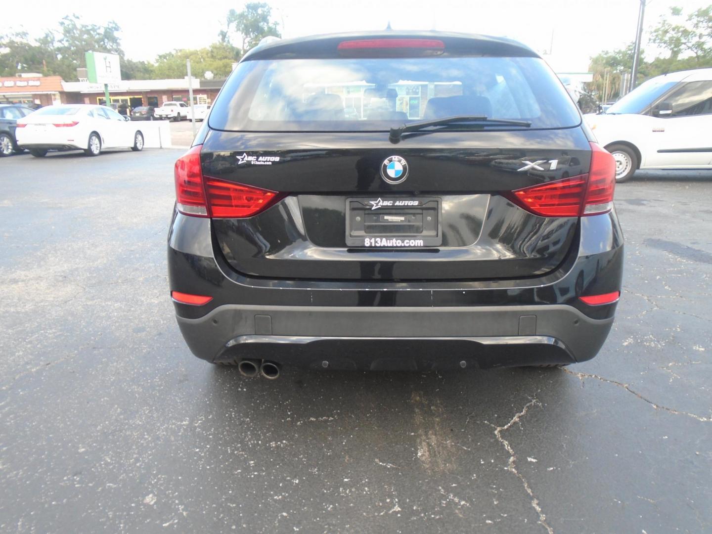 2014 BMW X1 xDrive28i (WBAVL1C55EV) with an 2.0L L4 DOHC 16V engine, 8-Speed Automatic transmission, located at 6112 N Florida Avenue, Tampa, FL, 33604, (888) 521-5131, 27.954929, -82.459534 - Photo#4