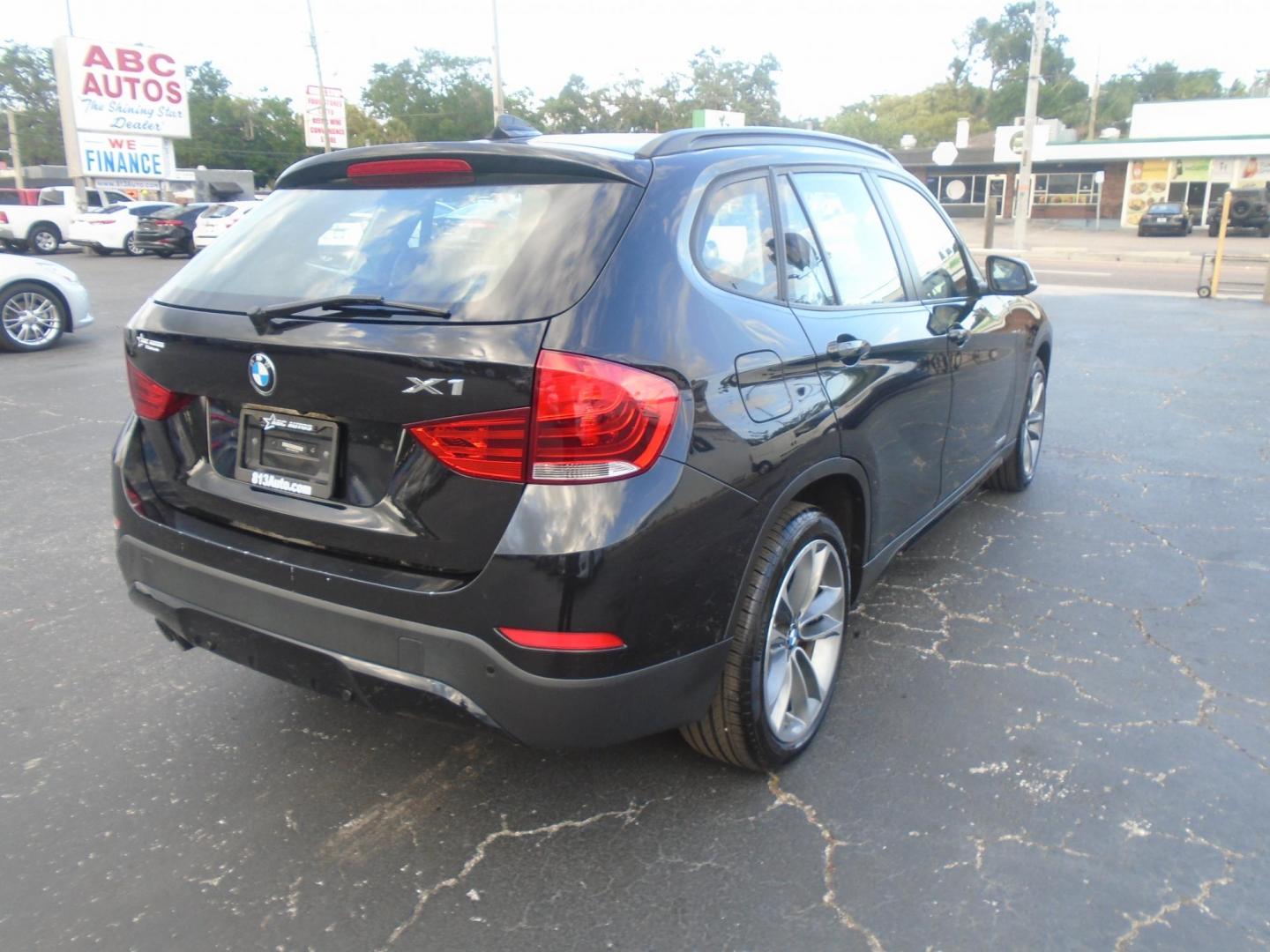 2014 BMW X1 xDrive28i (WBAVL1C55EV) with an 2.0L L4 DOHC 16V engine, 8-Speed Automatic transmission, located at 6112 N Florida Avenue, Tampa, FL, 33604, (888) 521-5131, 27.954929, -82.459534 - Photo#5