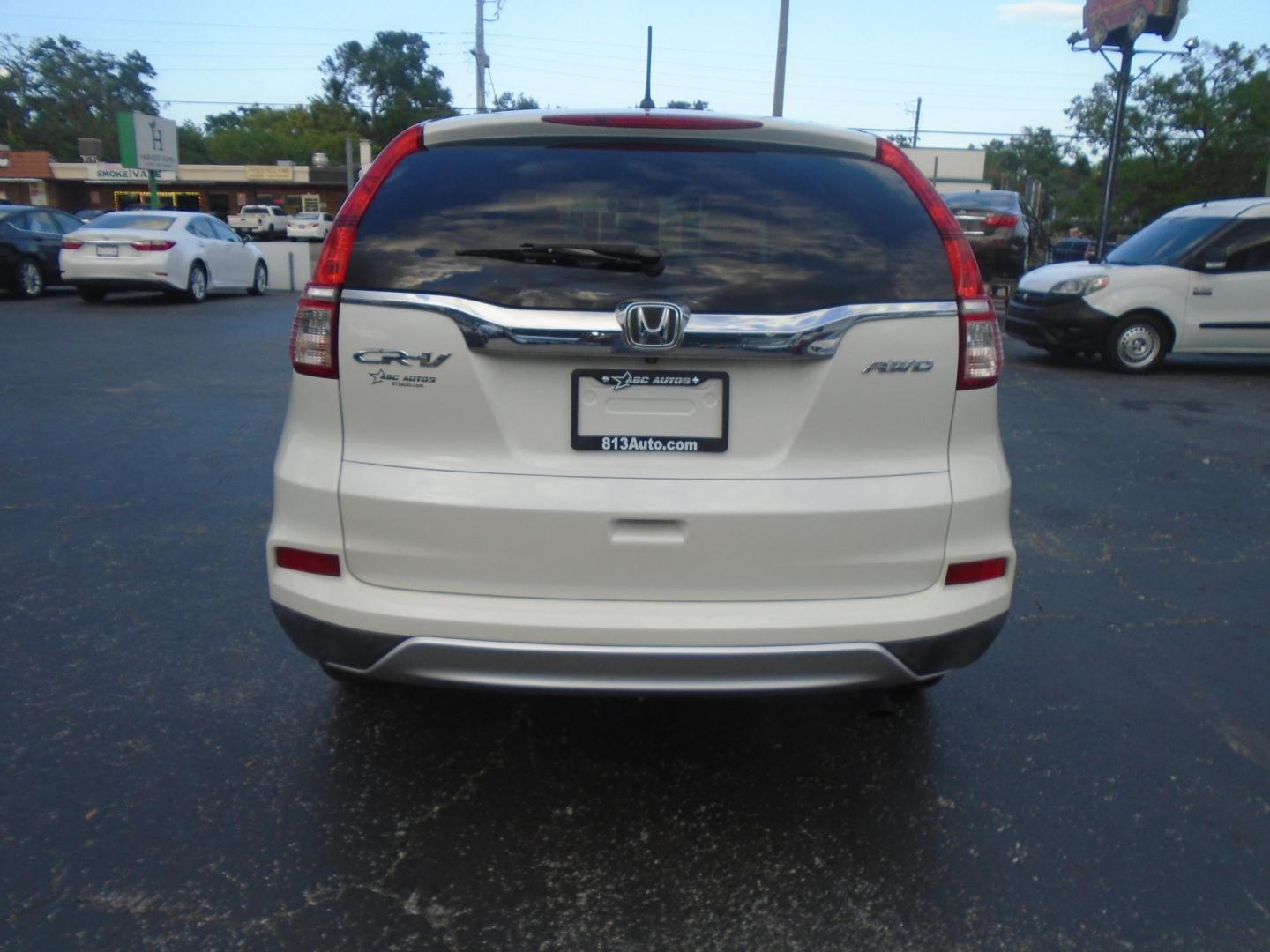 2015 Honda CR-V EX 4WD (5J6RM4H53FL) with an 2.4L L4 DOHC 16V engine, Continuously Variable Transmission transmission, located at 6112 N Florida Avenue, Tampa, FL, 33604, (888) 521-5131, 27.954929, -82.459534 - Photo#4