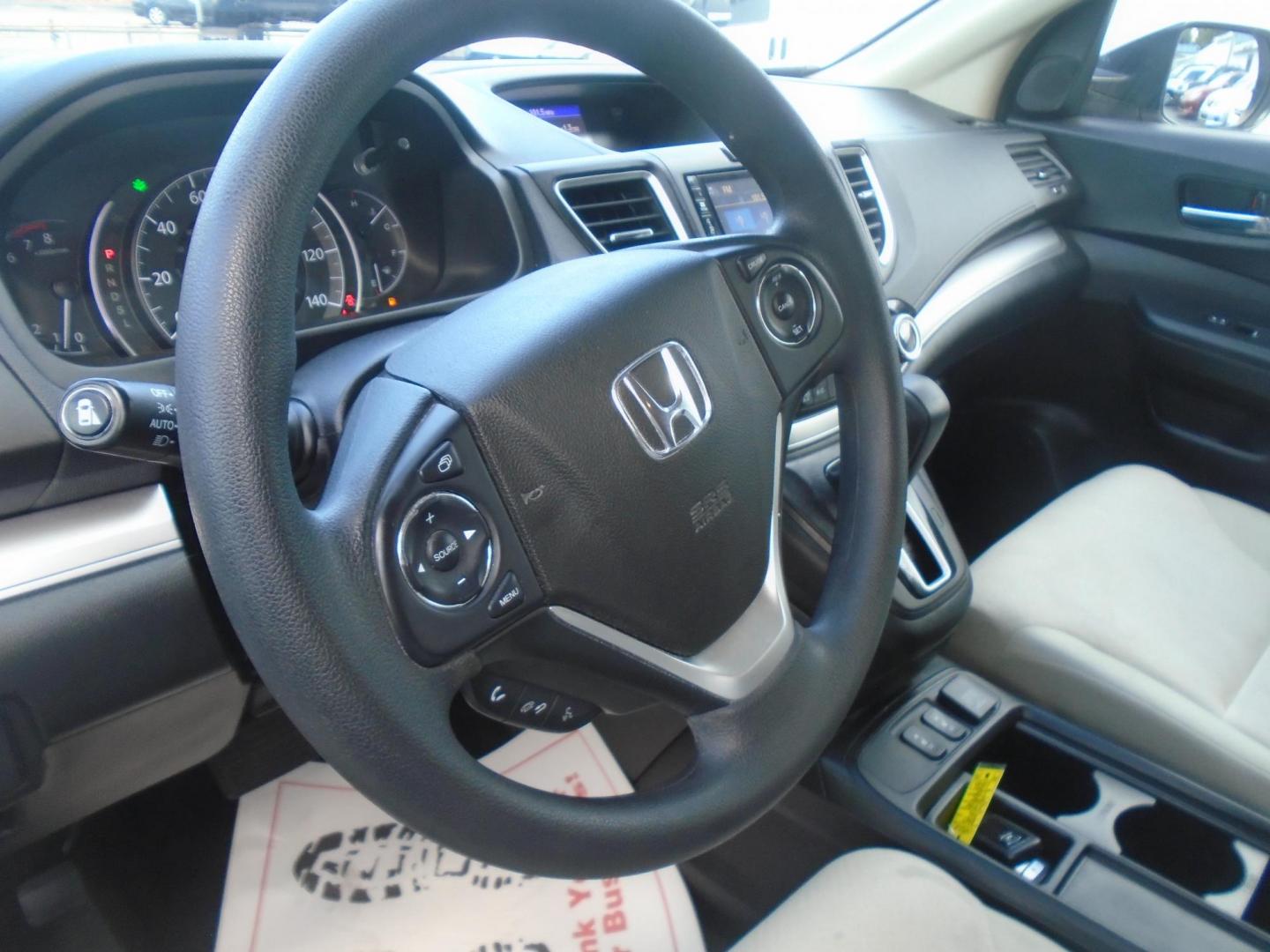 2015 Honda CR-V EX 4WD (5J6RM4H53FL) with an 2.4L L4 DOHC 16V engine, Continuously Variable Transmission transmission, located at 6112 N Florida Avenue, Tampa, FL, 33604, (888) 521-5131, 27.954929, -82.459534 - Photo#9