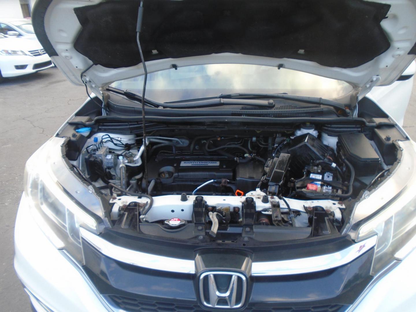 2015 Honda CR-V EX 4WD (5J6RM4H53FL) with an 2.4L L4 DOHC 16V engine, Continuously Variable Transmission transmission, located at 6112 N Florida Avenue, Tampa, FL, 33604, (888) 521-5131, 27.954929, -82.459534 - Photo#10