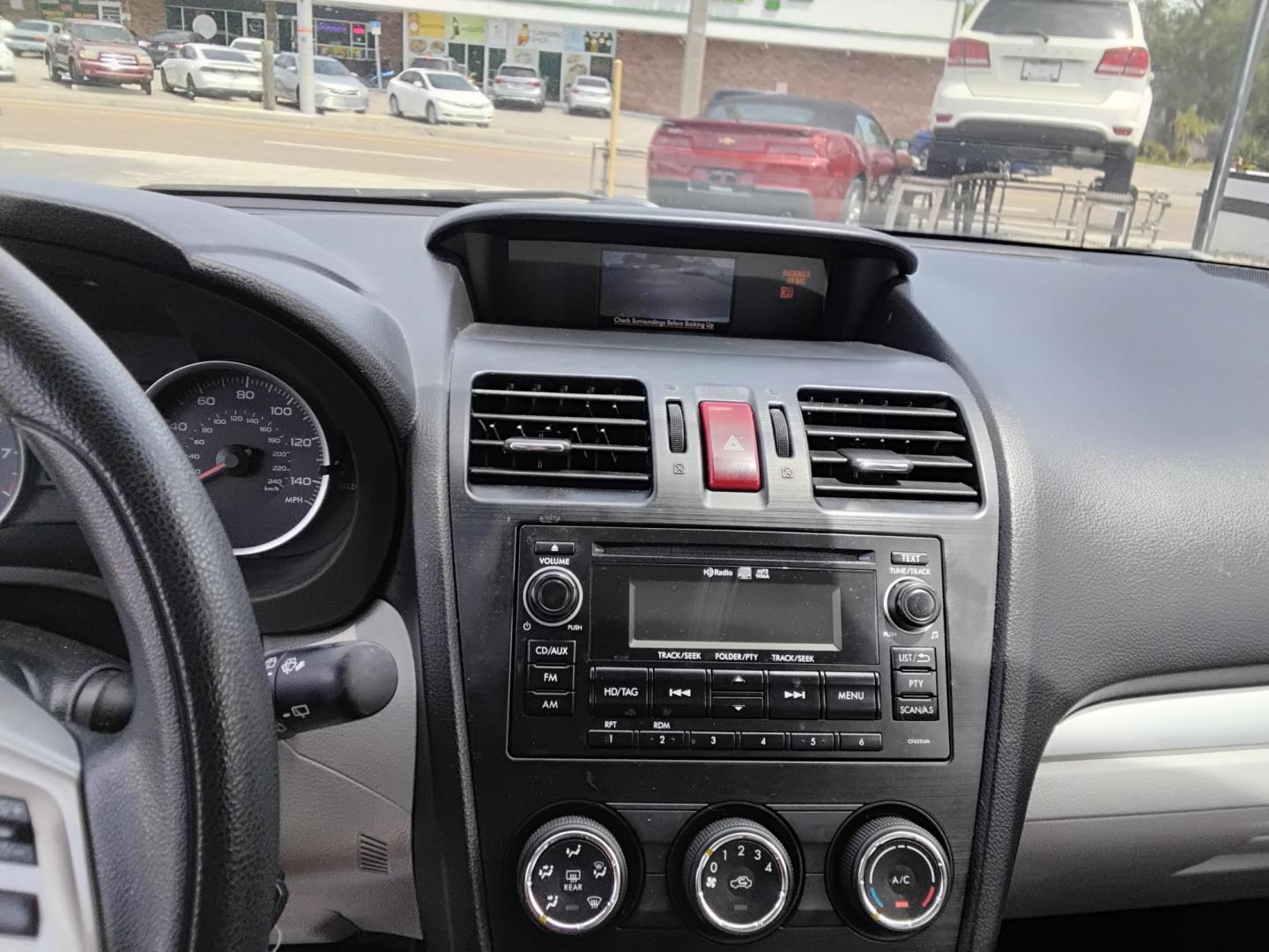 2015 GREEN /Beige Subaru Forester 2.5i Premium (JF2SJADC4FH) with an 2.5L H4 SOHC 16V engine, 6-Speed Automatic transmission, located at 6112 N Florida Avenue, Tampa, FL, 33604, (888) 521-5131, 27.954929, -82.459534 - 499$ DOWN PLUS TAX & TAG. - Photo#5