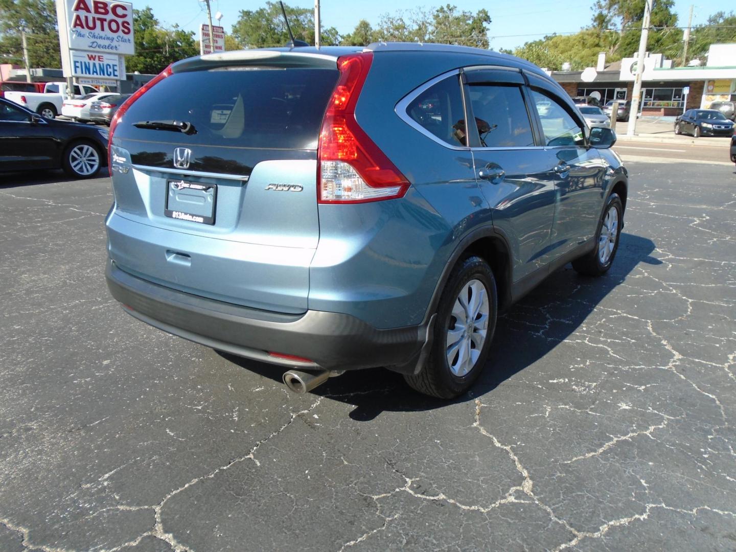 2013 Honda CR-V EX-L 4WD 5-Speed AT (5J6RM4H78DL) with an 2.4L L4 DOHC 16V engine, 5-Speed Automatic transmission, located at 6112 N Florida Avenue, Tampa, FL, 33604, (888) 521-5131, 27.954929, -82.459534 - Photo#3