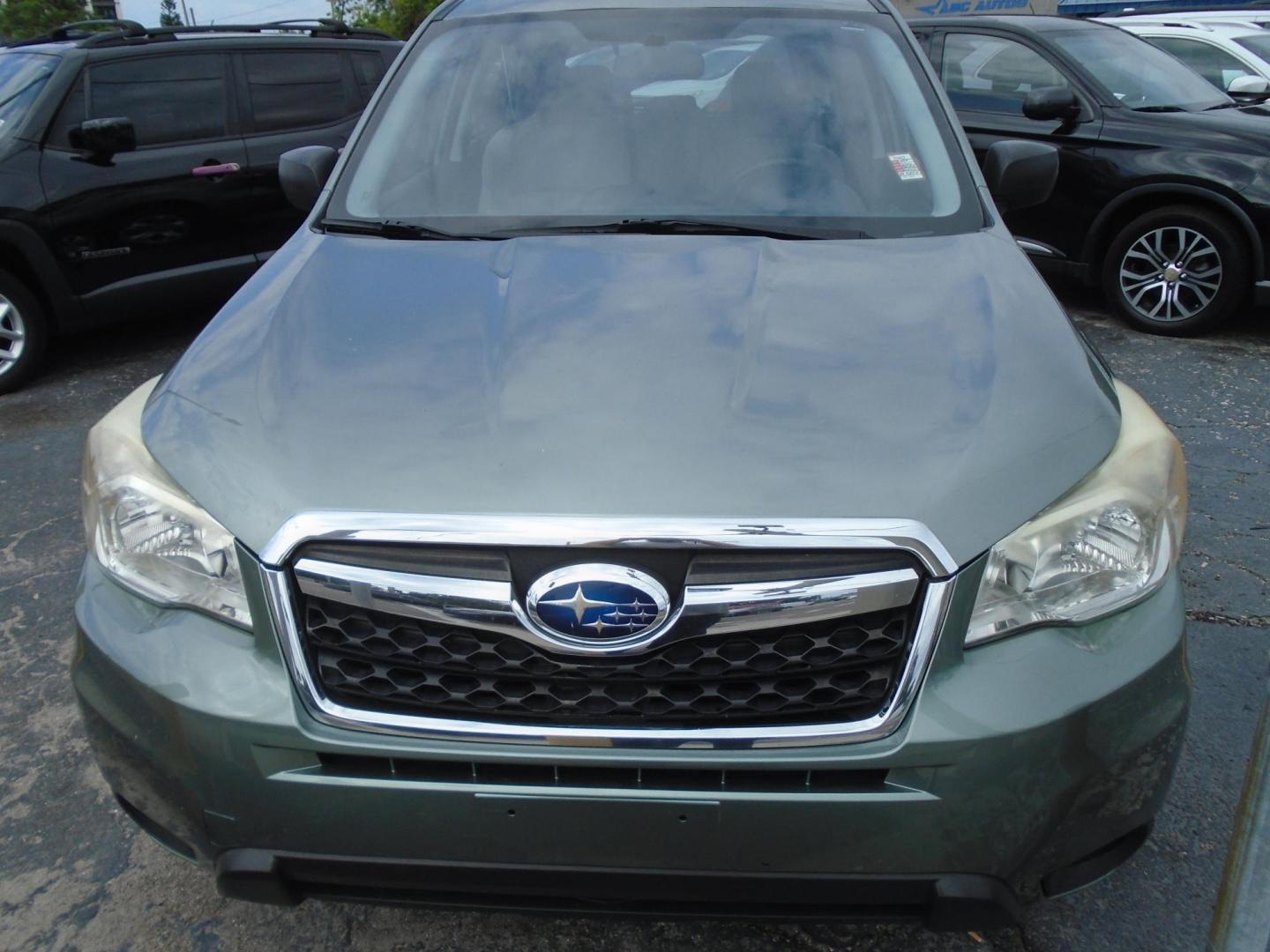 2014 Subaru Forester 2.5i (JF2SJAAC3EH) with an 2.5L H4 SOHC 16V engine, 6-Speed Automatic transmission, located at 6112 N Florida Avenue, Tampa, FL, 33604, (888) 521-5131, 27.954929, -82.459534 - Photo#1
