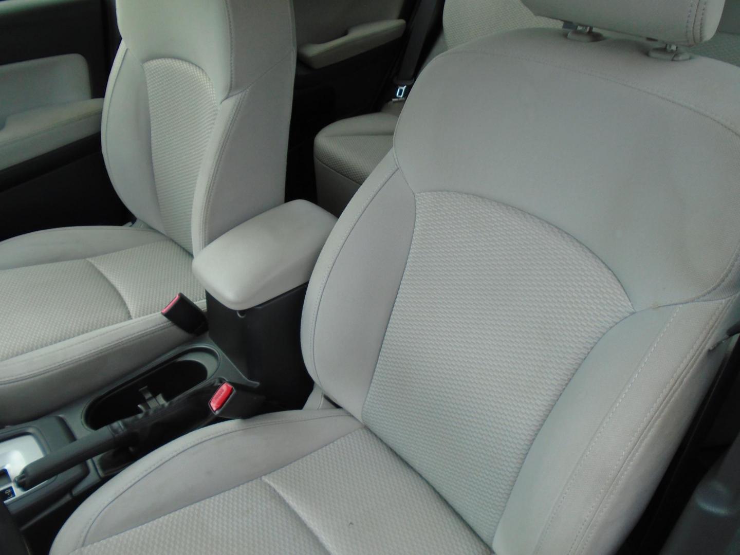 2014 Subaru Forester 2.5i (JF2SJAAC3EH) with an 2.5L H4 SOHC 16V engine, 6-Speed Automatic transmission, located at 6112 N Florida Avenue, Tampa, FL, 33604, (888) 521-5131, 27.954929, -82.459534 - Photo#4