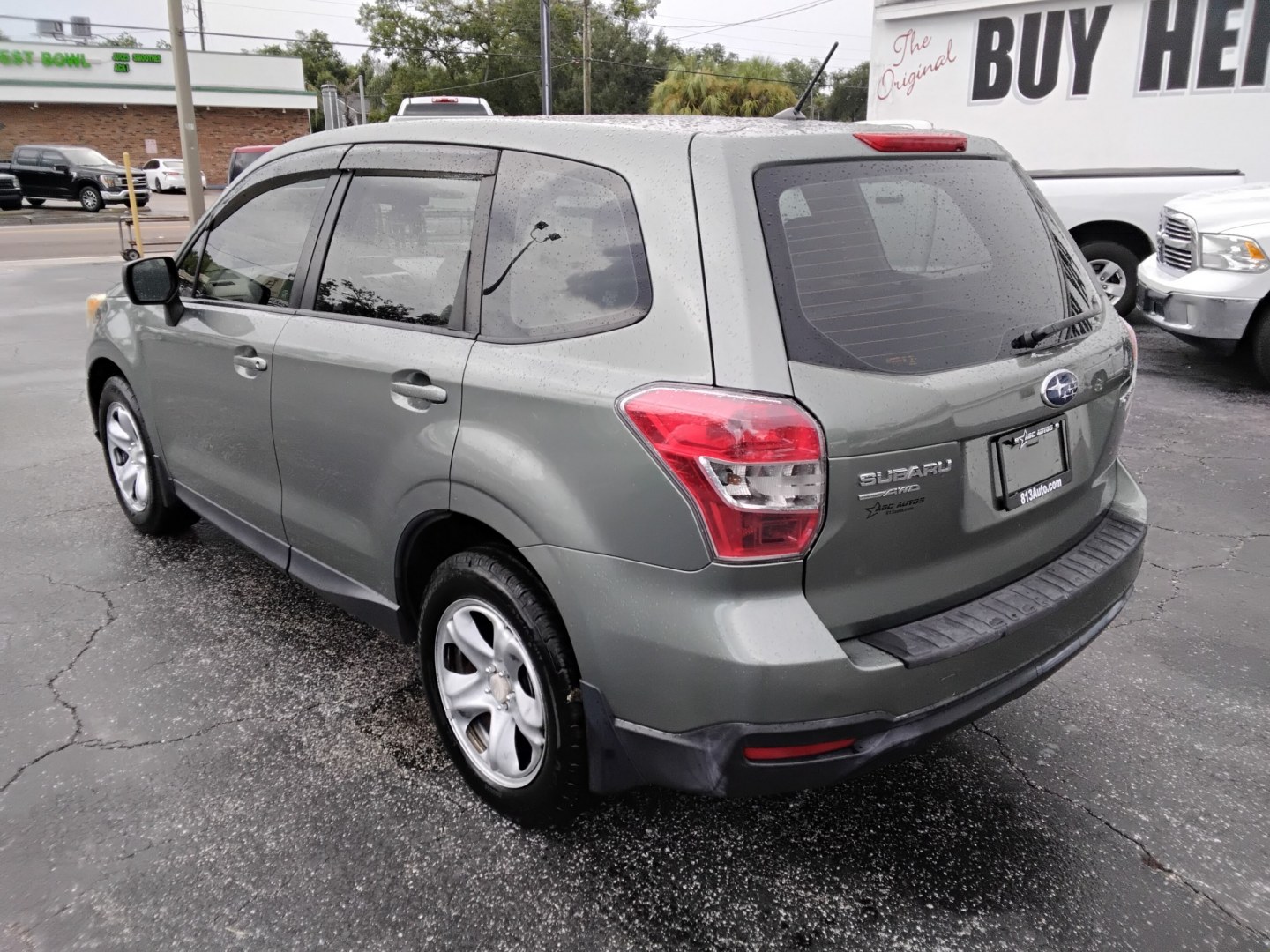 2014 MINT GREEN /Beige Subaru Forester 2.5i (JF2SJAAC3EH) with an 2.5L H4 SOHC 16V engine, 6-Speed Automatic transmission, located at 6112 N Florida Avenue, Tampa, FL, 33604, (888) 521-5131, 27.954929, -82.459534 - $499 DOWN PLUS TAX & TAG.- Photo#5