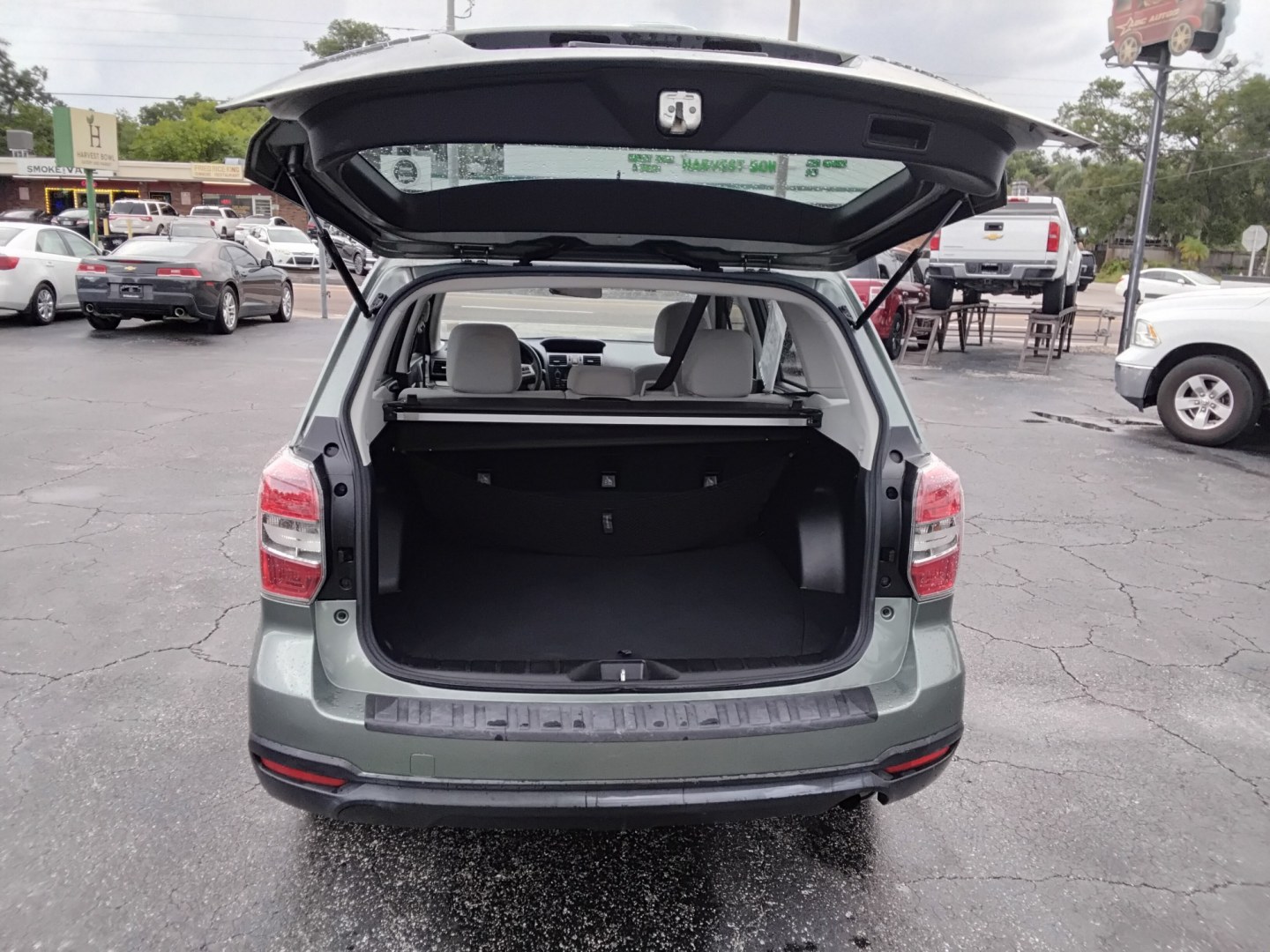 2014 MINT GREEN /Beige Subaru Forester 2.5i (JF2SJAAC3EH) with an 2.5L H4 SOHC 16V engine, 6-Speed Automatic transmission, located at 6112 N Florida Avenue, Tampa, FL, 33604, (888) 521-5131, 27.954929, -82.459534 - $499 DOWN PLUS TAX & TAG.- Photo#7