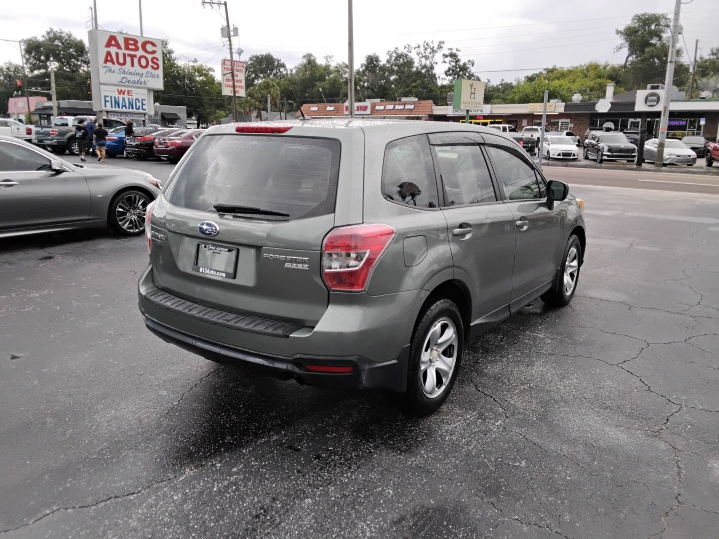 2014 MINT GREEN /Beige Subaru Forester 2.5i (JF2SJAAC3EH) with an 2.5L H4 SOHC 16V engine, 6-Speed Automatic transmission, located at 6112 N Florida Avenue, Tampa, FL, 33604, (888) 521-5131, 27.954929, -82.459534 - $499 DOWN PLUS TAX & TAG.- Photo#4
