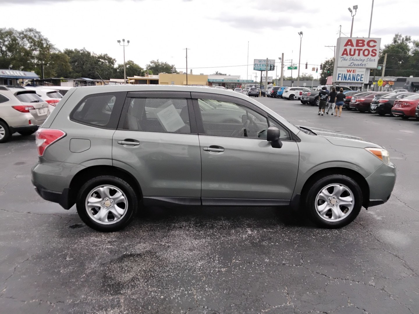 2014 MINT GREEN /Beige Subaru Forester 2.5i (JF2SJAAC3EH) with an 2.5L H4 SOHC 16V engine, 6-Speed Automatic transmission, located at 6112 N Florida Avenue, Tampa, FL, 33604, (888) 521-5131, 27.954929, -82.459534 - $499 DOWN PLUS TAX & TAG.- Photo#3
