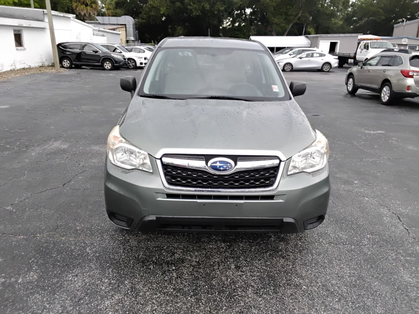 2014 MINT GREEN /Beige Subaru Forester 2.5i (JF2SJAAC3EH) with an 2.5L H4 SOHC 16V engine, 6-Speed Automatic transmission, located at 6112 N Florida Avenue, Tampa, FL, 33604, (888) 521-5131, 27.954929, -82.459534 - $499 DOWN PLUS TAX & TAG.- Photo#2