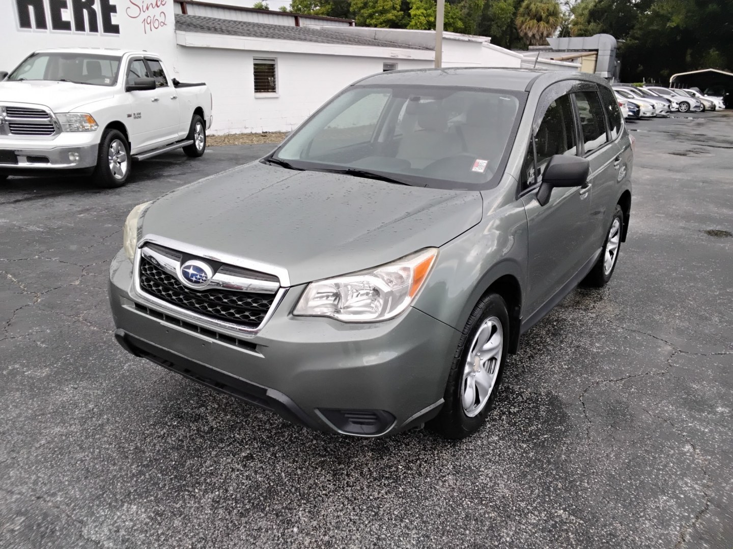 2014 MINT GREEN /Beige Subaru Forester 2.5i (JF2SJAAC3EH) with an 2.5L H4 SOHC 16V engine, 6-Speed Automatic transmission, located at 6112 N Florida Avenue, Tampa, FL, 33604, (888) 521-5131, 27.954929, -82.459534 - $499 DOWN PLUS TAX & TAG.- Photo#1