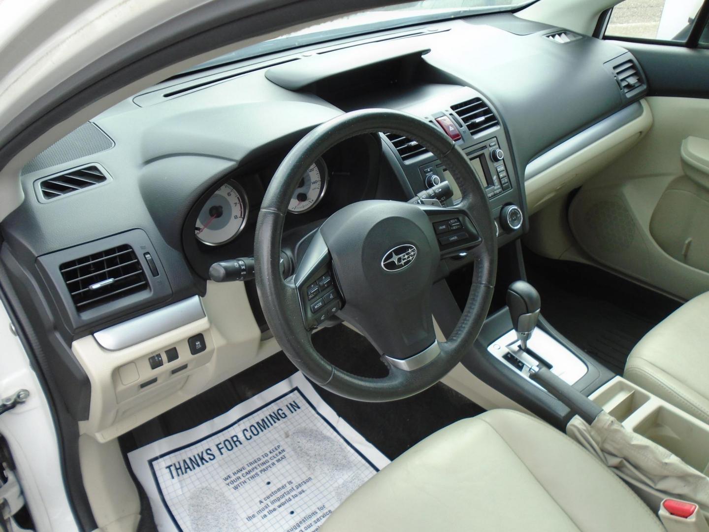 2012 Subaru Impreza Limited 5-Door (JF1GPAG64CH) with an 2.0L H4 DOHC 16V engine, Continuously Variable Transmission transmission, located at 6112 N Florida Avenue, Tampa, FL, 33604, (888) 521-5131, 27.954929, -82.459534 - Photo#3