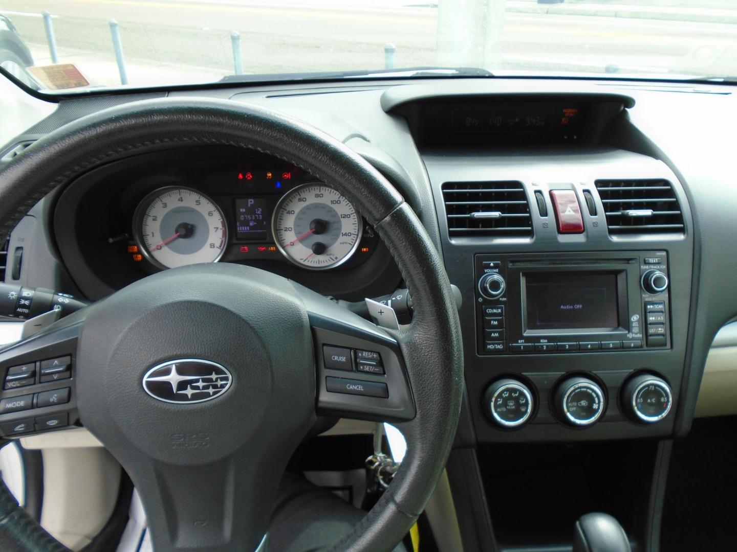 2012 Subaru Impreza Limited 5-Door (JF1GPAG64CH) with an 2.0L H4 DOHC 16V engine, Continuously Variable Transmission transmission, located at 6112 N Florida Avenue, Tampa, FL, 33604, (888) 521-5131, 27.954929, -82.459534 - Photo#6