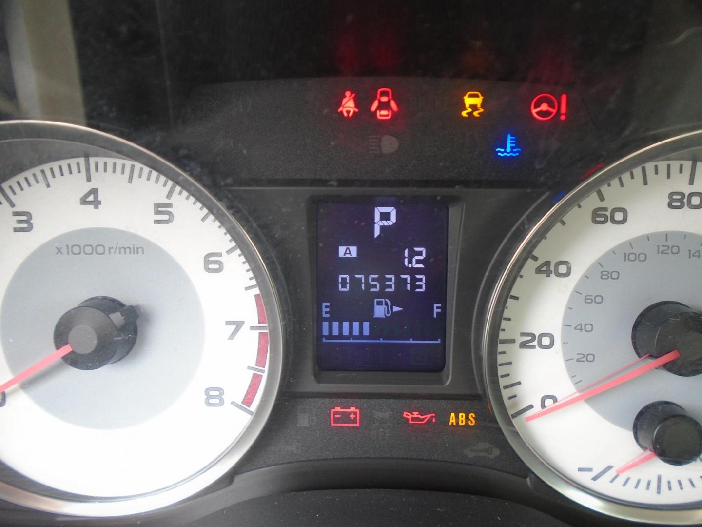 2012 Subaru Impreza Limited 5-Door (JF1GPAG64CH) with an 2.0L H4 DOHC 16V engine, Continuously Variable Transmission transmission, located at 6112 N Florida Avenue, Tampa, FL, 33604, (888) 521-5131, 27.954929, -82.459534 - Photo#7