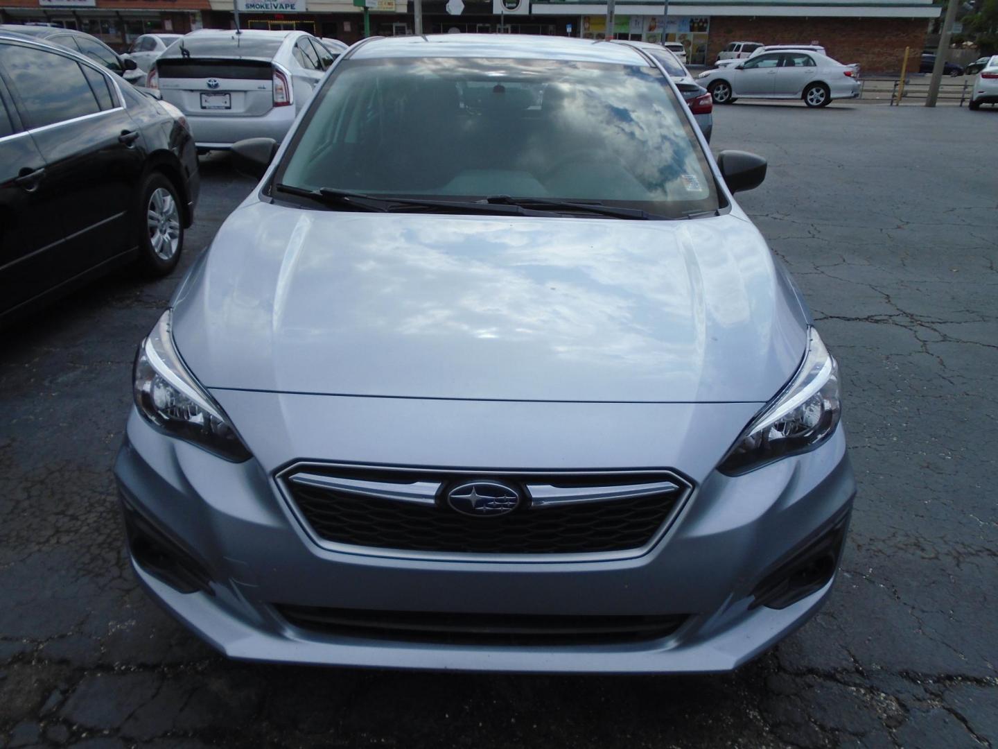 2018 Subaru Impreza 2.0i CVT 5-Door (4S3GTAA66J3) with an 2.0L H4 DOHC 16V engine, CVT transmission, located at 6112 N Florida Avenue, Tampa, FL, 33604, (888) 521-5131, 27.954929, -82.459534 - Photo#1