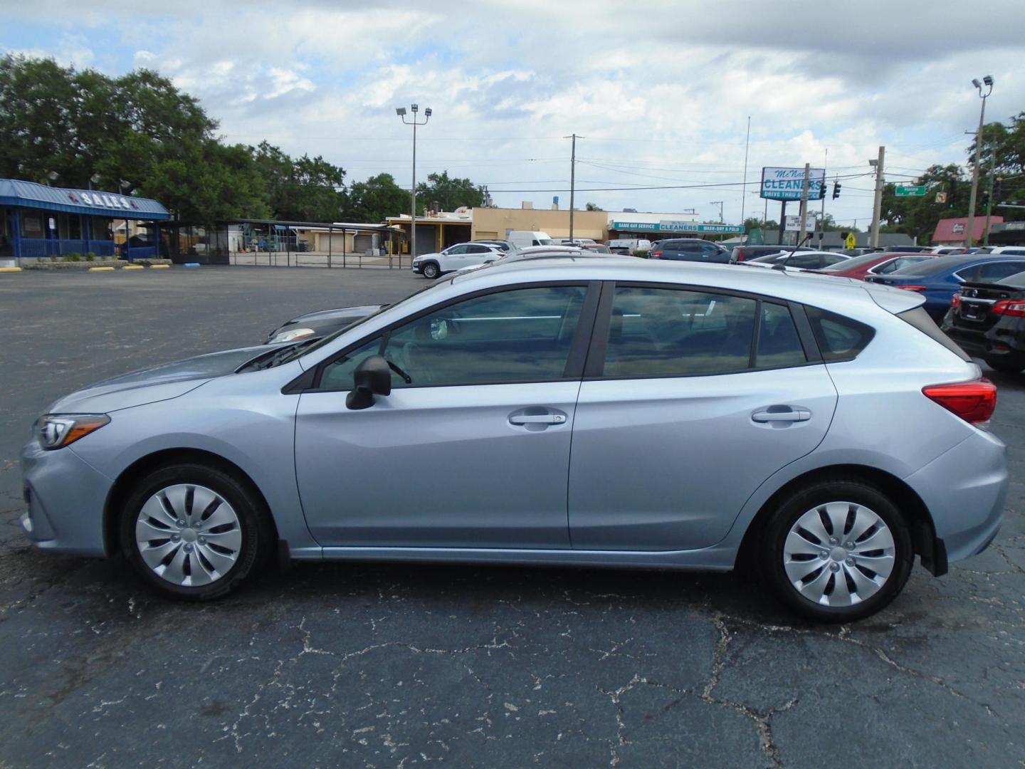 2018 Subaru Impreza 2.0i CVT 5-Door (4S3GTAA66J3) with an 2.0L H4 DOHC 16V engine, CVT transmission, located at 6112 N Florida Avenue, Tampa, FL, 33604, (888) 521-5131, 27.954929, -82.459534 - Photo#0
