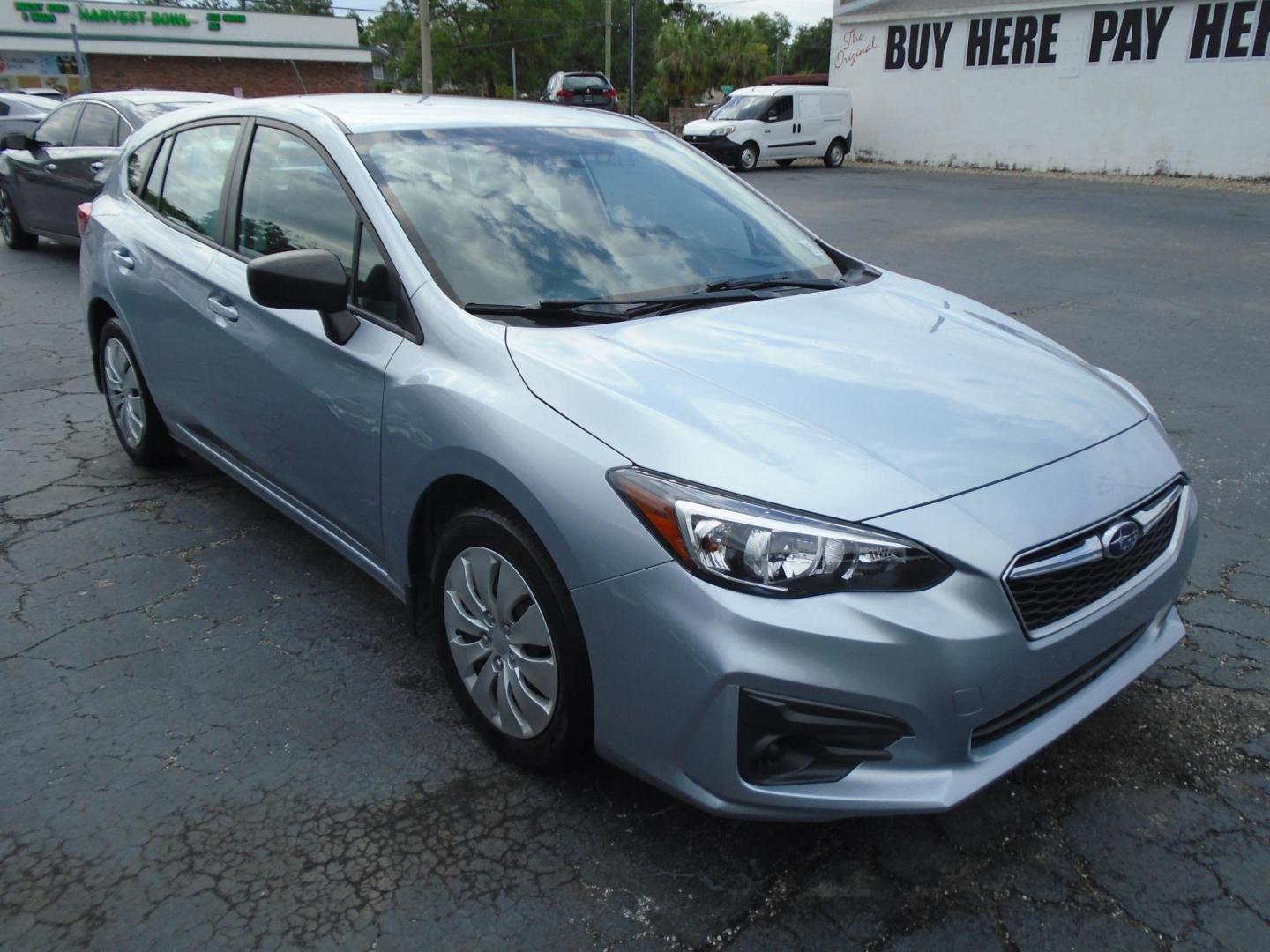 2018 Subaru Impreza 2.0i CVT 5-Door (4S3GTAA66J3) with an 2.0L H4 DOHC 16V engine, CVT transmission, located at 6112 N Florida Avenue, Tampa, FL, 33604, (888) 521-5131, 27.954929, -82.459534 - Photo#2