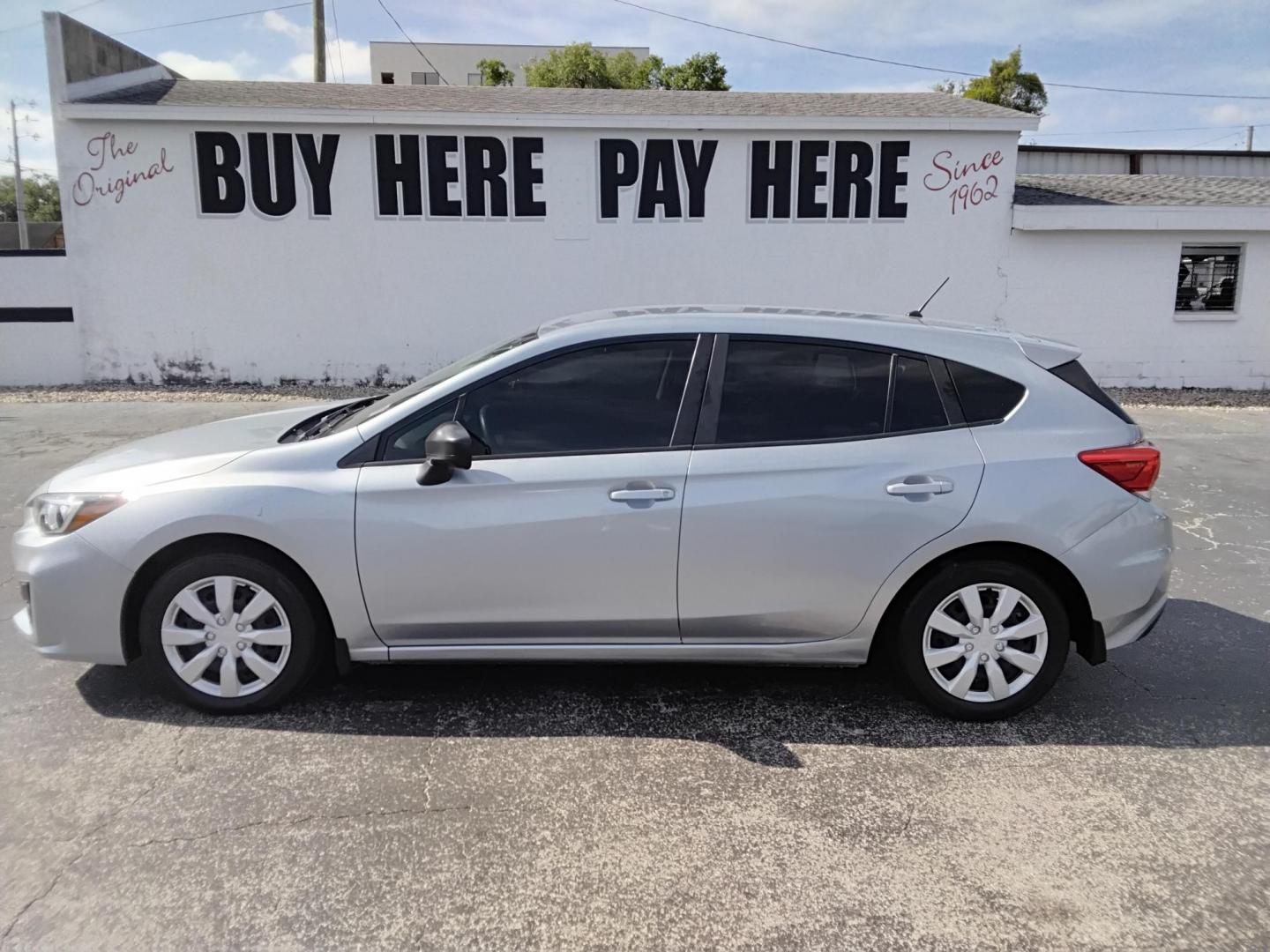 2018 SILVER /Black Subaru Impreza 2.0i CVT 5-Door (4S3GTAA66J3) with an 2.0L H4 DOHC 16V engine, CVT transmission, located at 6112 N Florida Avenue, Tampa, FL, 33604, (888) 521-5131, 27.954929, -82.459534 - $499 DOWN PLUS TAX & TAG.- Photo#0