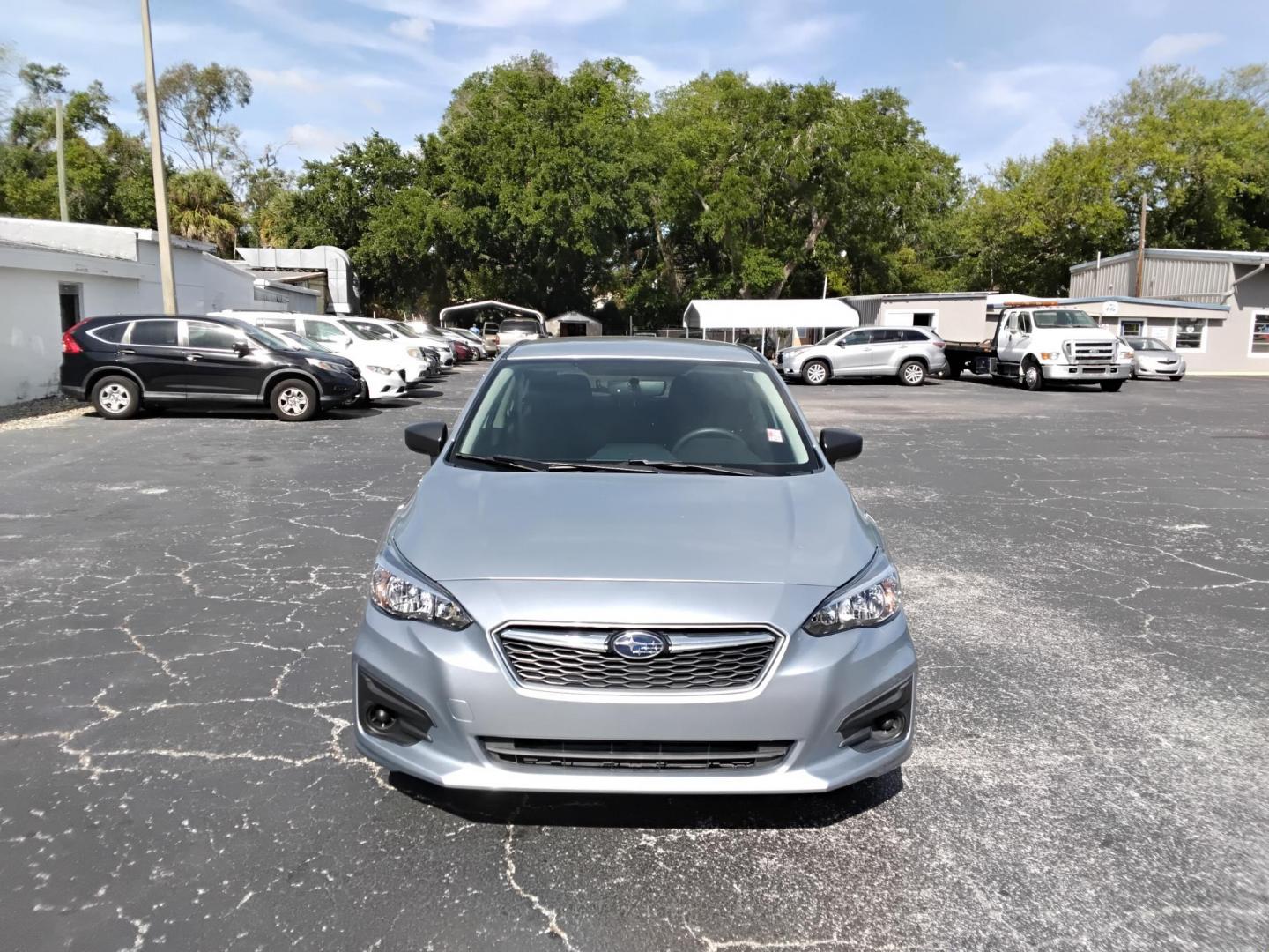 2018 SILVER /Black Subaru Impreza 2.0i CVT 5-Door (4S3GTAA66J3) with an 2.0L H4 DOHC 16V engine, CVT transmission, located at 6112 N Florida Avenue, Tampa, FL, 33604, (888) 521-5131, 27.954929, -82.459534 - $499 DOWN PLUS TAX & TAG. - Photo#1