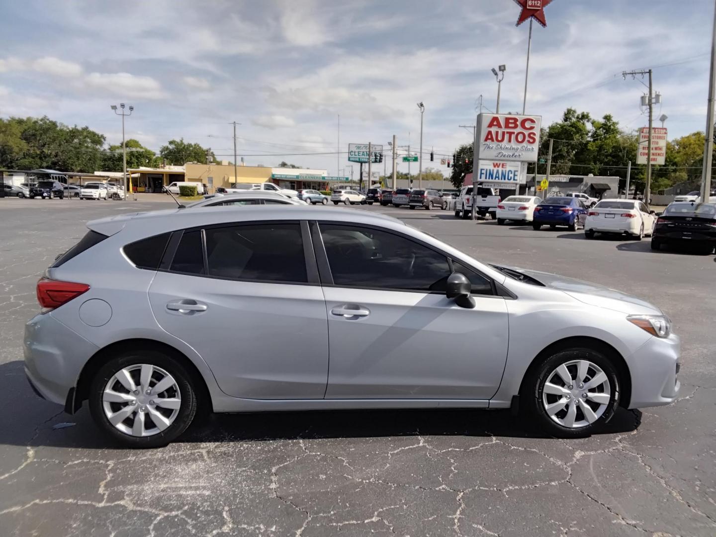 2018 SILVER /Black Subaru Impreza 2.0i CVT 5-Door (4S3GTAA66J3) with an 2.0L H4 DOHC 16V engine, CVT transmission, located at 6112 N Florida Avenue, Tampa, FL, 33604, (888) 521-5131, 27.954929, -82.459534 - $499 DOWN PLUS TAX & TAG.- Photo#2
