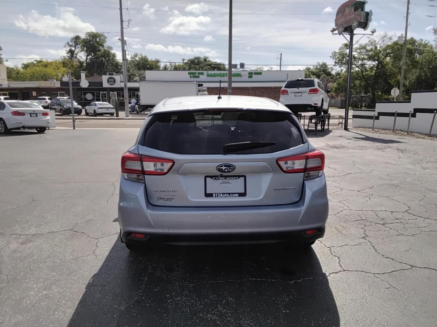 2018 SILVER /Black Subaru Impreza 2.0i CVT 5-Door (4S3GTAA66J3) with an 2.0L H4 DOHC 16V engine, CVT transmission, located at 6112 N Florida Avenue, Tampa, FL, 33604, (888) 521-5131, 27.954929, -82.459534 - $499 DOWN PLUS TAX & TAG. - Photo#3