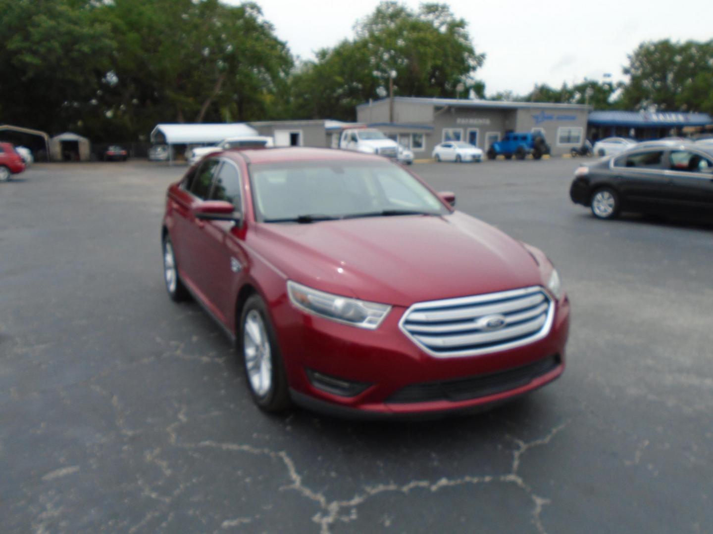 2015 Ford Taurus SEL FWD (1FAHP2E83FG) with an 3.5L V6 DOHC 24V engine, 6-Speed Automatic transmission, located at 6112 N Florida Avenue, Tampa, FL, 33604, (888) 521-5131, 27.954929, -82.459534 - Photo#3