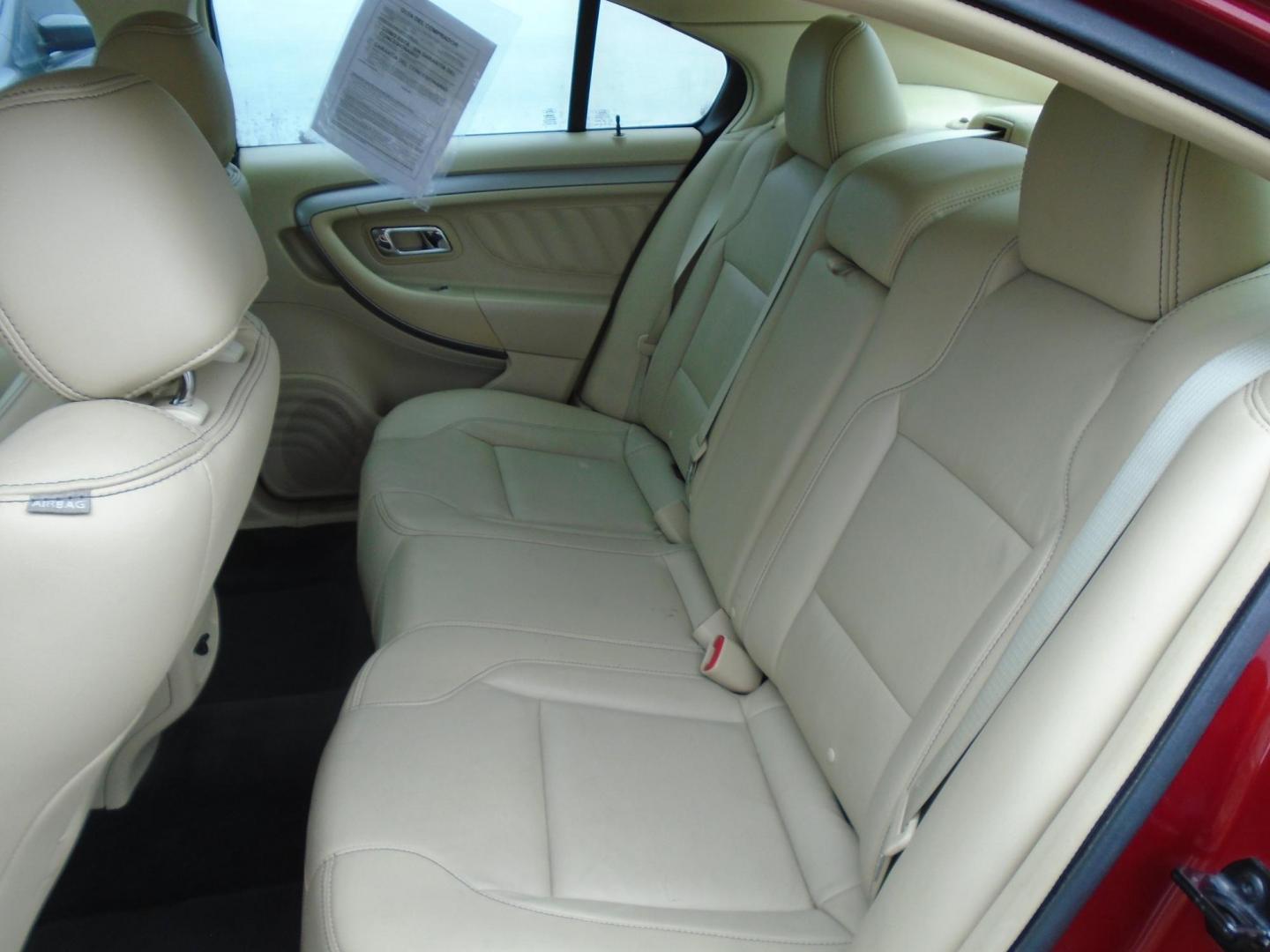 2015 Ford Taurus SEL FWD (1FAHP2E83FG) with an 3.5L V6 DOHC 24V engine, 6-Speed Automatic transmission, located at 6112 N Florida Avenue, Tampa, FL, 33604, (888) 521-5131, 27.954929, -82.459534 - Photo#10