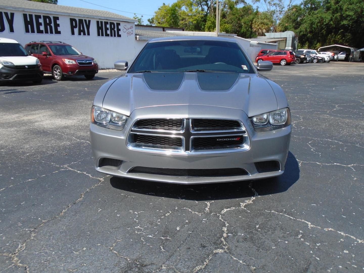 2014 Dodge Charger SE (2C3CDXBG6EH) with an 3.6L V6 DOHC 24V engine, 5-Speed Automatic transmission, located at 6112 N Florida Avenue, Tampa, FL, 33604, (888) 521-5131, 27.954929, -82.459534 - Photo#1
