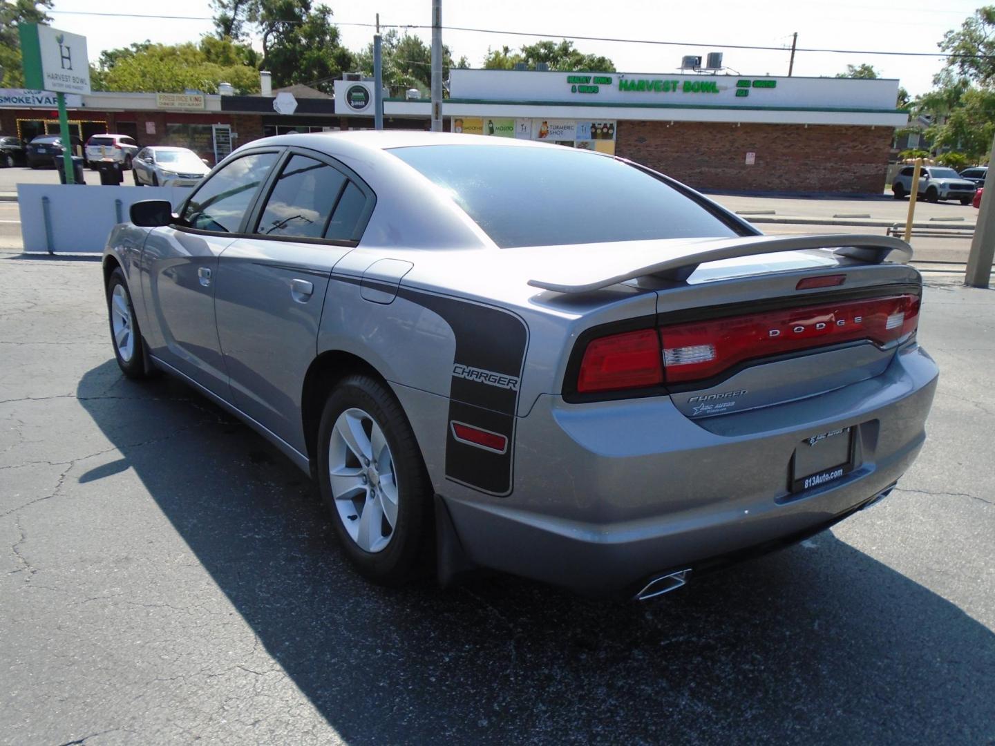 2014 Dodge Charger SE (2C3CDXBG6EH) with an 3.6L V6 DOHC 24V engine, 5-Speed Automatic transmission, located at 6112 N Florida Avenue, Tampa, FL, 33604, (888) 521-5131, 27.954929, -82.459534 - Photo#2