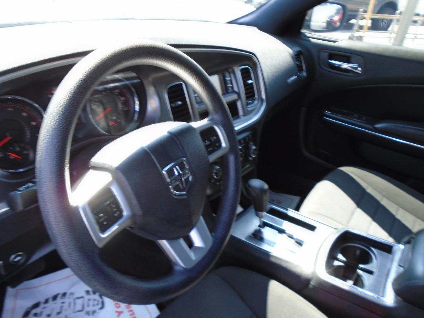 2014 Dodge Charger SE (2C3CDXBG6EH) with an 3.6L V6 DOHC 24V engine, 5-Speed Automatic transmission, located at 6112 N Florida Avenue, Tampa, FL, 33604, (888) 521-5131, 27.954929, -82.459534 - Photo#3