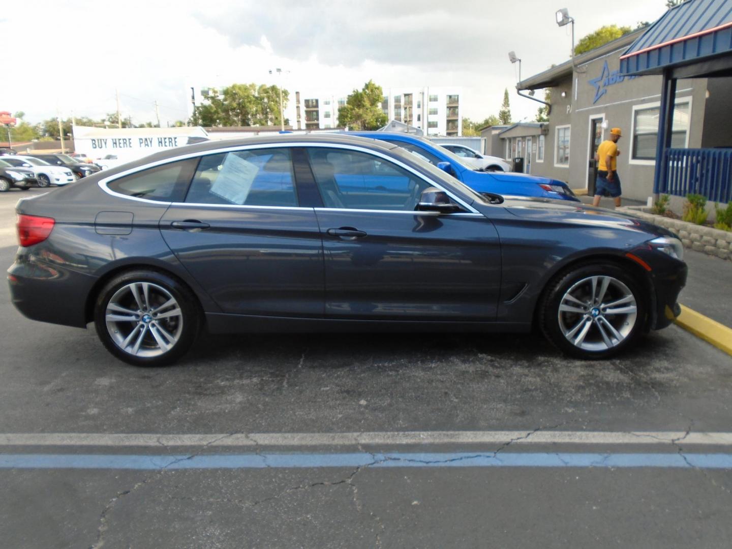 2017 BMW 3-Series Gran Turismo 330i xDrive (WBA8Z9C35HG) with an 2.0L L4 DOHC 16V engine, 8A transmission, located at 6112 N Florida Avenue, Tampa, FL, 33604, (888) 521-5131, 27.954929, -82.459534 - Photo#2