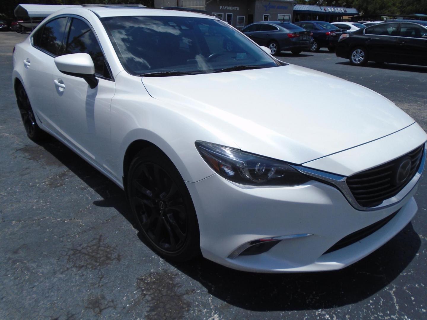 2016 Mazda Mazda6 i Grand Touring (JM1GJ1W56G1) with an 2.5L L4 DOHC 16V engine, 6-Speed Automatic transmission, located at 6112 N Florida Avenue, Tampa, FL, 33604, (888) 521-5131, 27.954929, -82.459534 - Photo#2