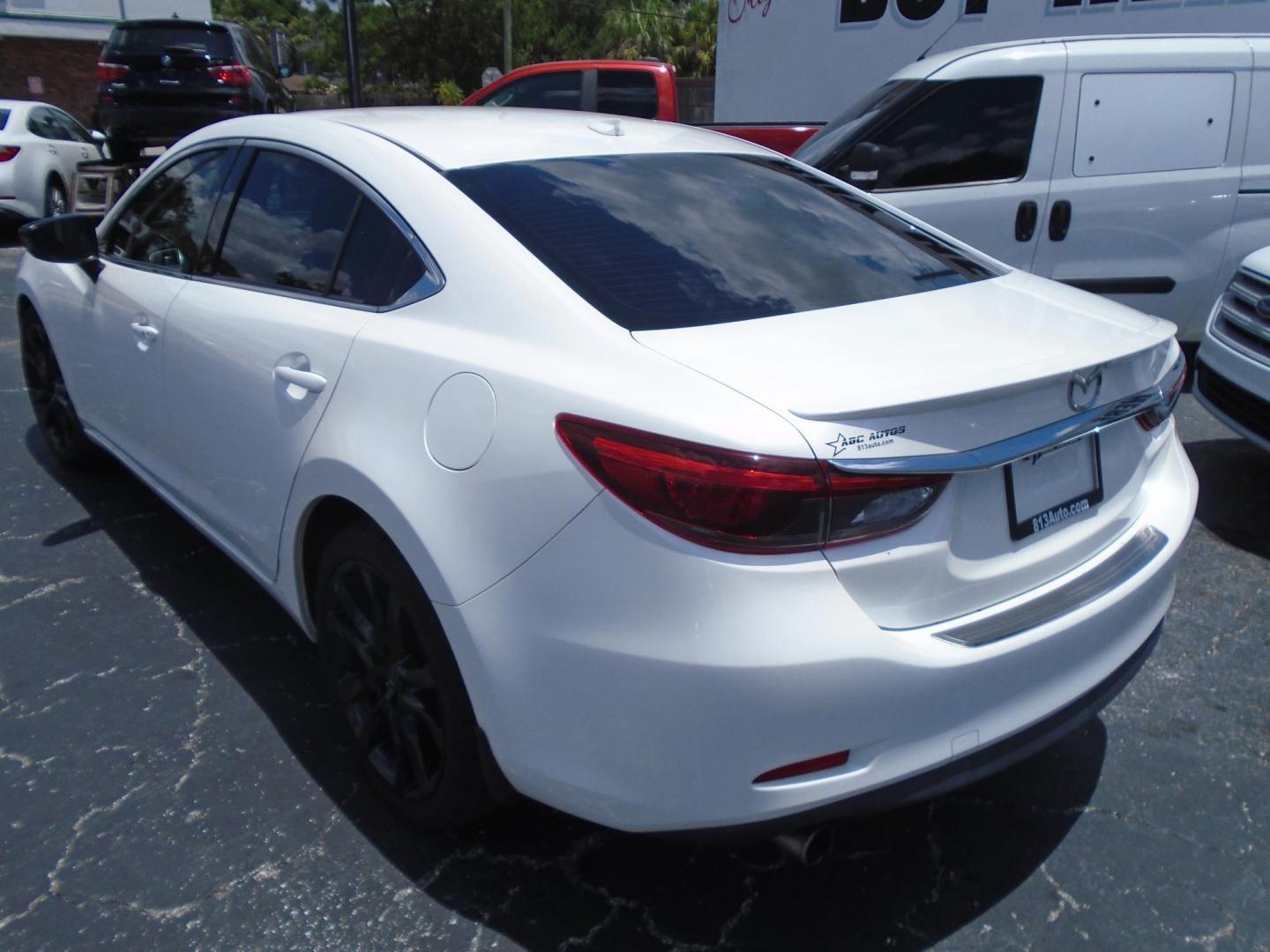 2016 Mazda Mazda6 i Grand Touring (JM1GJ1W56G1) with an 2.5L L4 DOHC 16V engine, 6-Speed Automatic transmission, located at 6112 N Florida Avenue, Tampa, FL, 33604, (888) 521-5131, 27.954929, -82.459534 - Photo#4