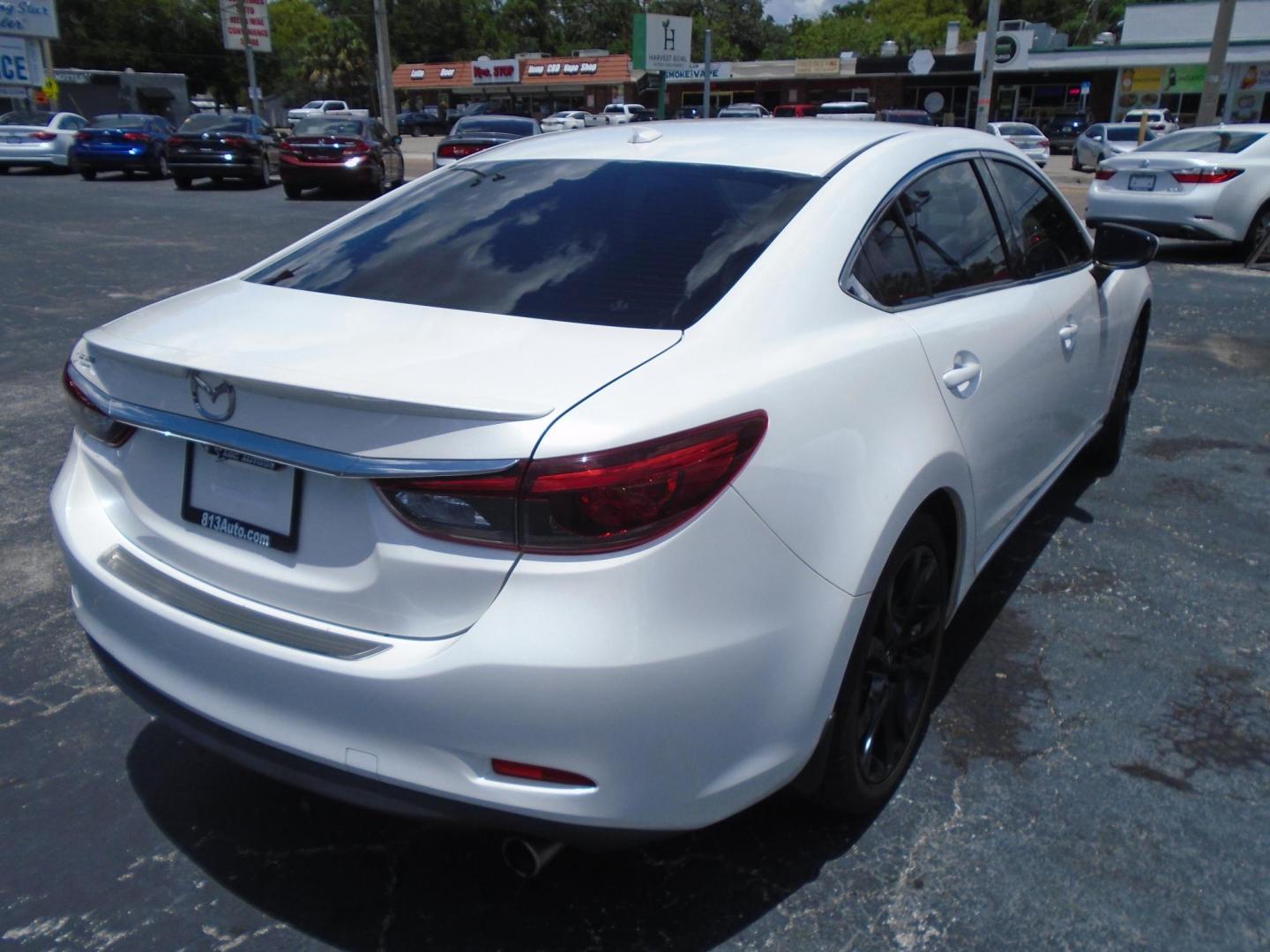 2016 Mazda Mazda6 i Grand Touring (JM1GJ1W56G1) with an 2.5L L4 DOHC 16V engine, 6-Speed Automatic transmission, located at 6112 N Florida Avenue, Tampa, FL, 33604, (888) 521-5131, 27.954929, -82.459534 - Photo#3