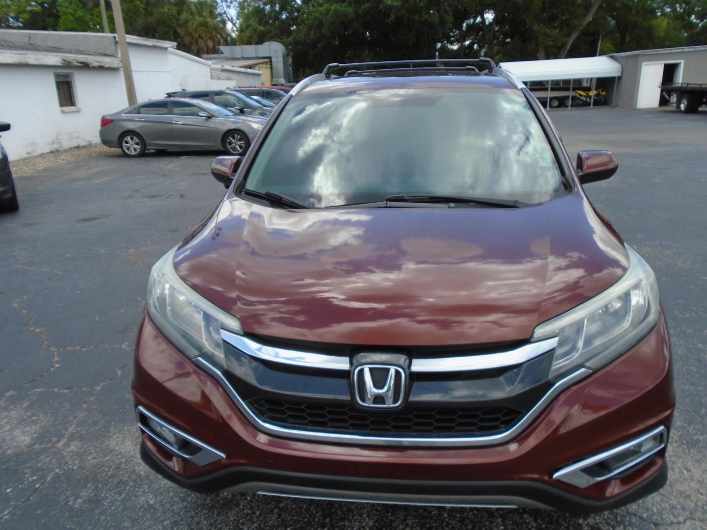 2016 Honda CR-V EX-L 2WD (2HKRM3H79GH) with an 2.4L L4 DOHC 16V engine, CVT transmission, located at 6112 N Florida Avenue, Tampa, FL, 33604, (888) 521-5131, 27.954929, -82.459534 - Photo#4